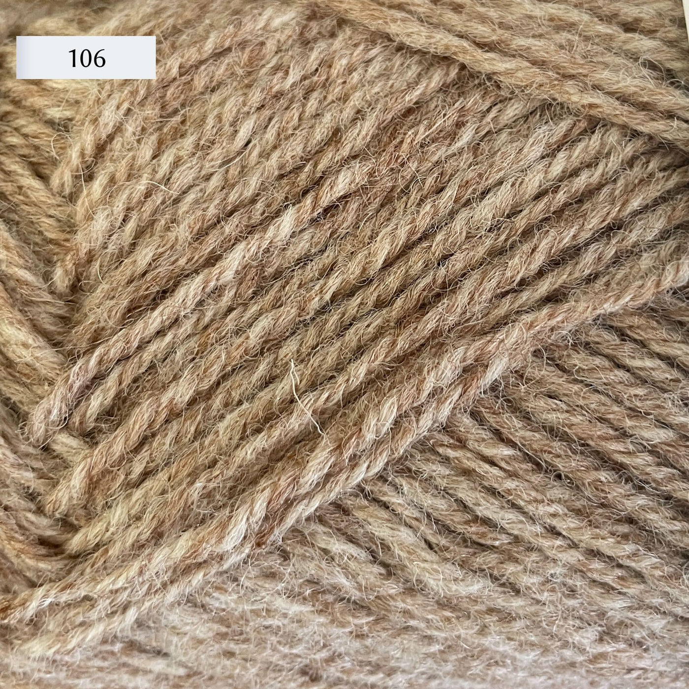 Rauma Strikkegarn, DK weight yarn, in color 106, a light heathered tan