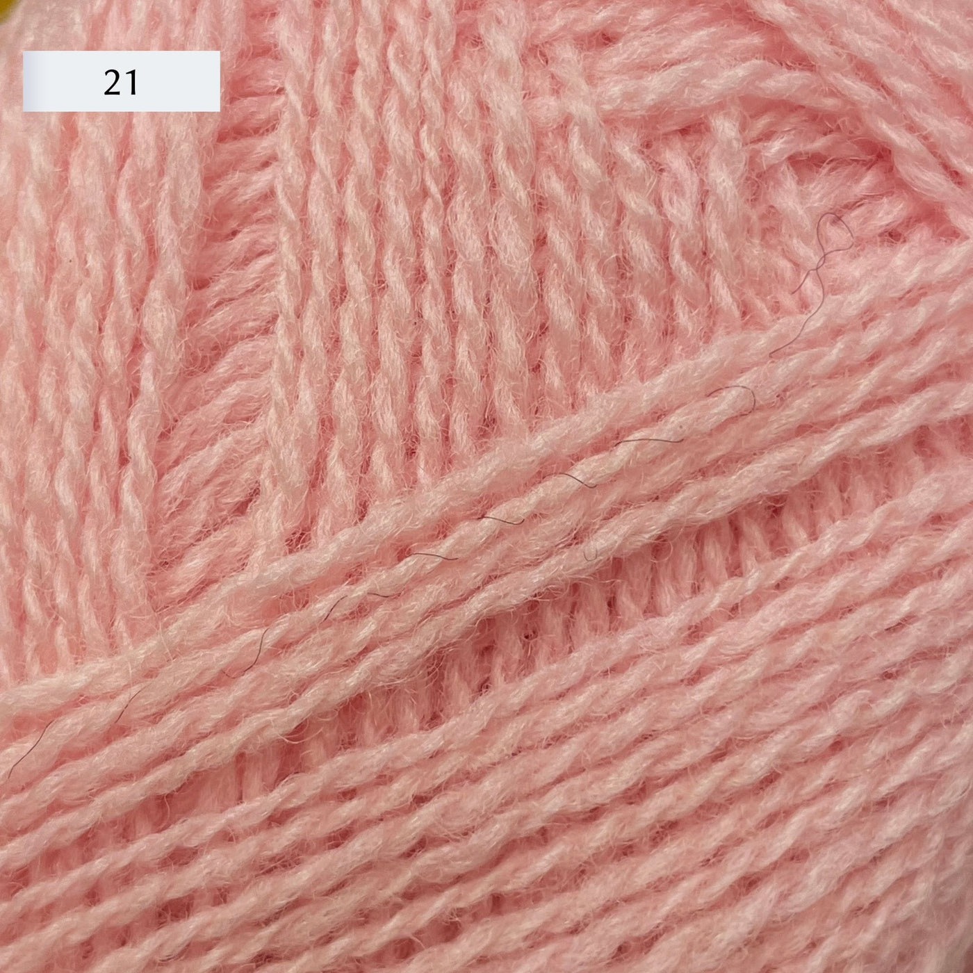 Rauma Lamullgarn, a fingering weight yarn, in color 21, a baby pink