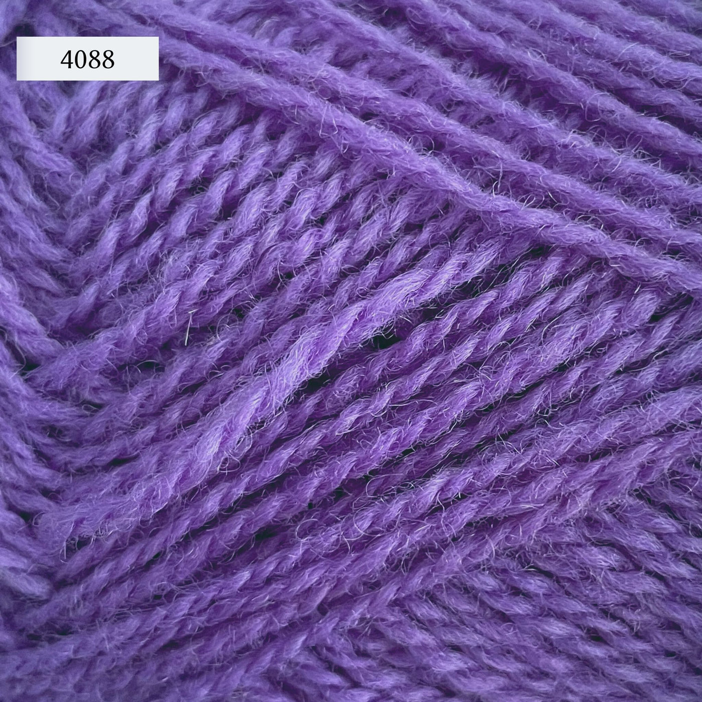 Rauma Finullgarn, a fingering/sport weight yarn, in color 4088, a medium purple
