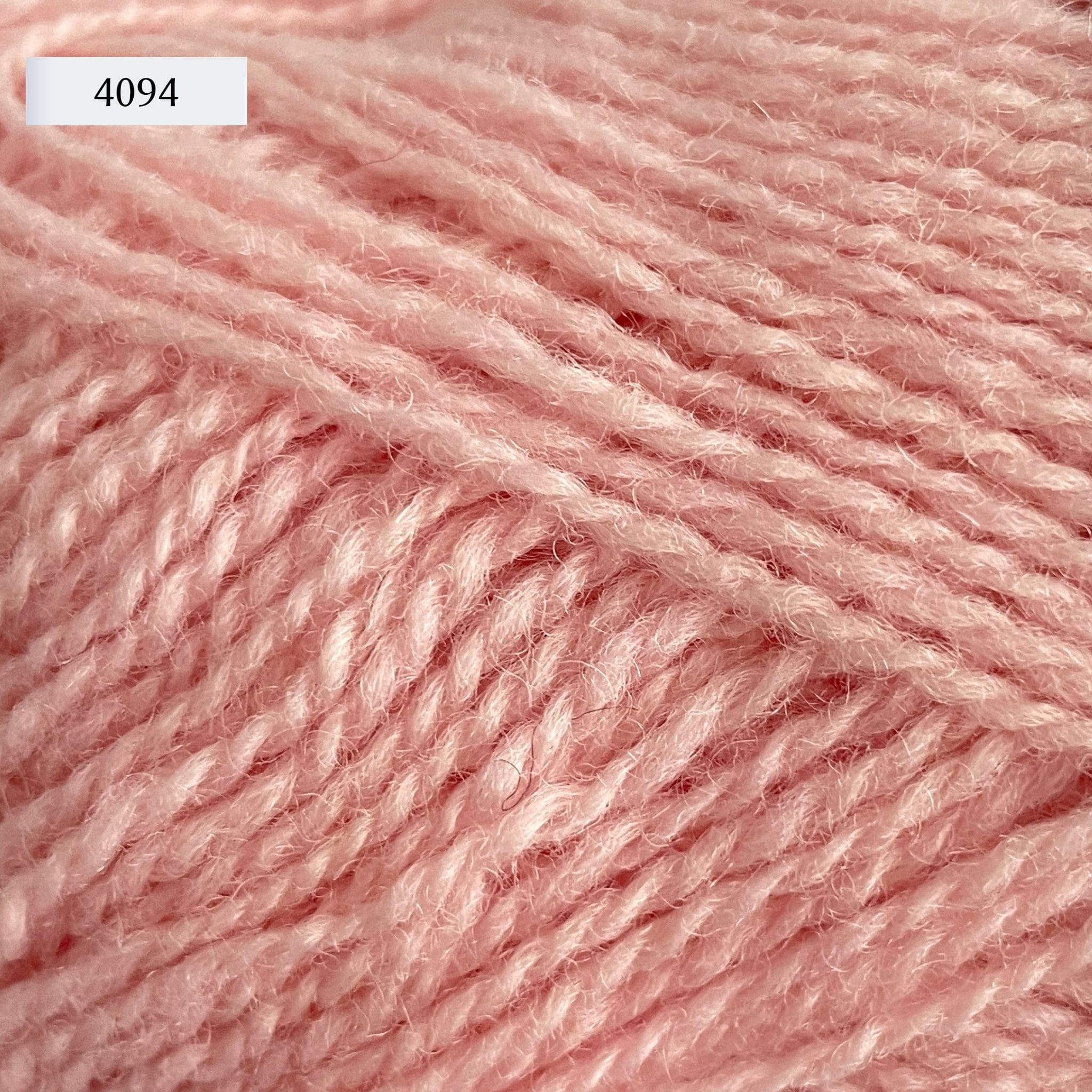 Rauma Finullgarn, a fingering/sport weight yarn, in color 4094, a light ballet pink