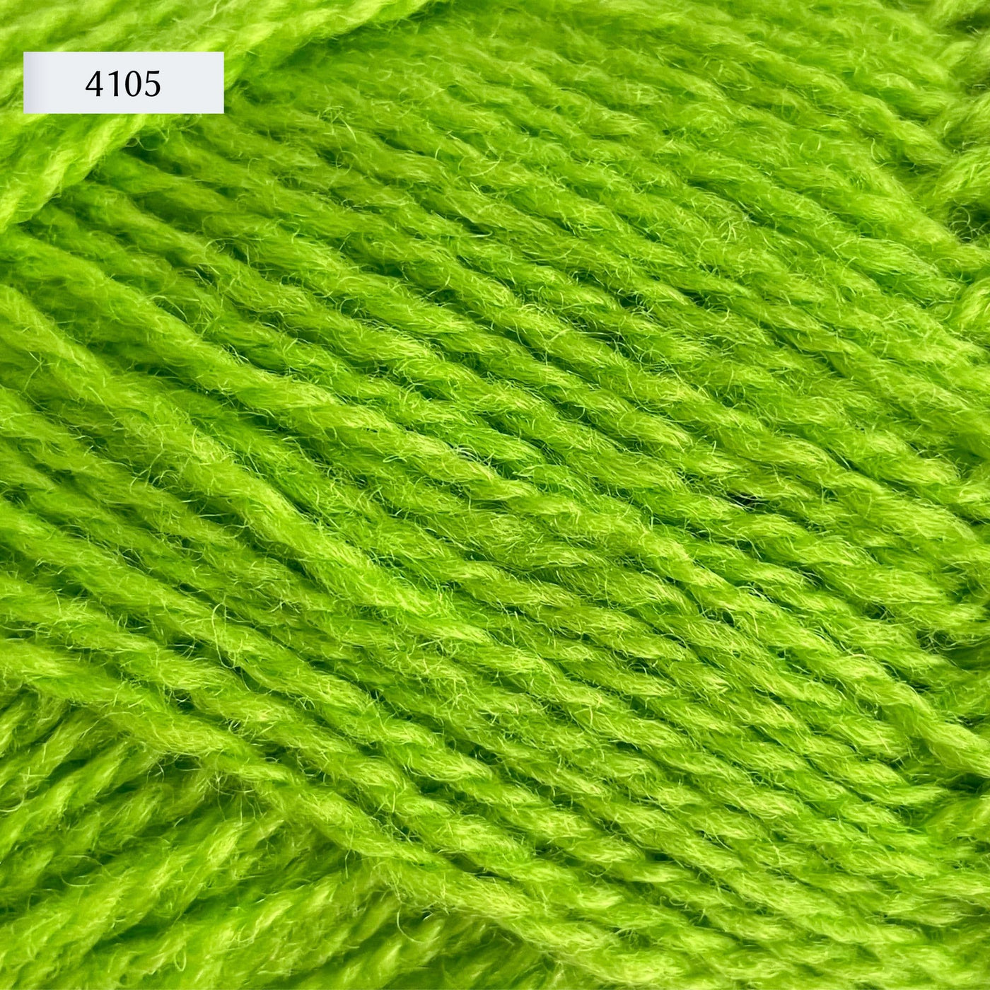 Rauma Finullgarn, a fingering/sport weight yarn, in color 4105, a bright acid green