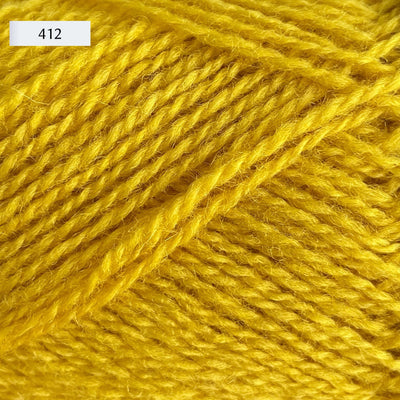 Rauma Finullgarn, a fingering/sport weight yarn, in color 412, a primary yellow