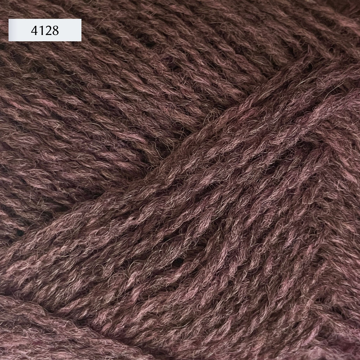 Rauma Finullgarn, a fingering/sport weight yarn, in color 4128, a heathered dark lavender
