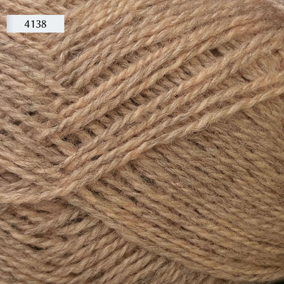 Rauma Finullgarn, a fingering/sport weight yarn, in color 4138, a heathered peach