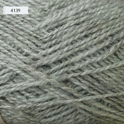 Rauma Finullgarn, a fingering/sport weight yarn, in color 4139, a heathered ice blue