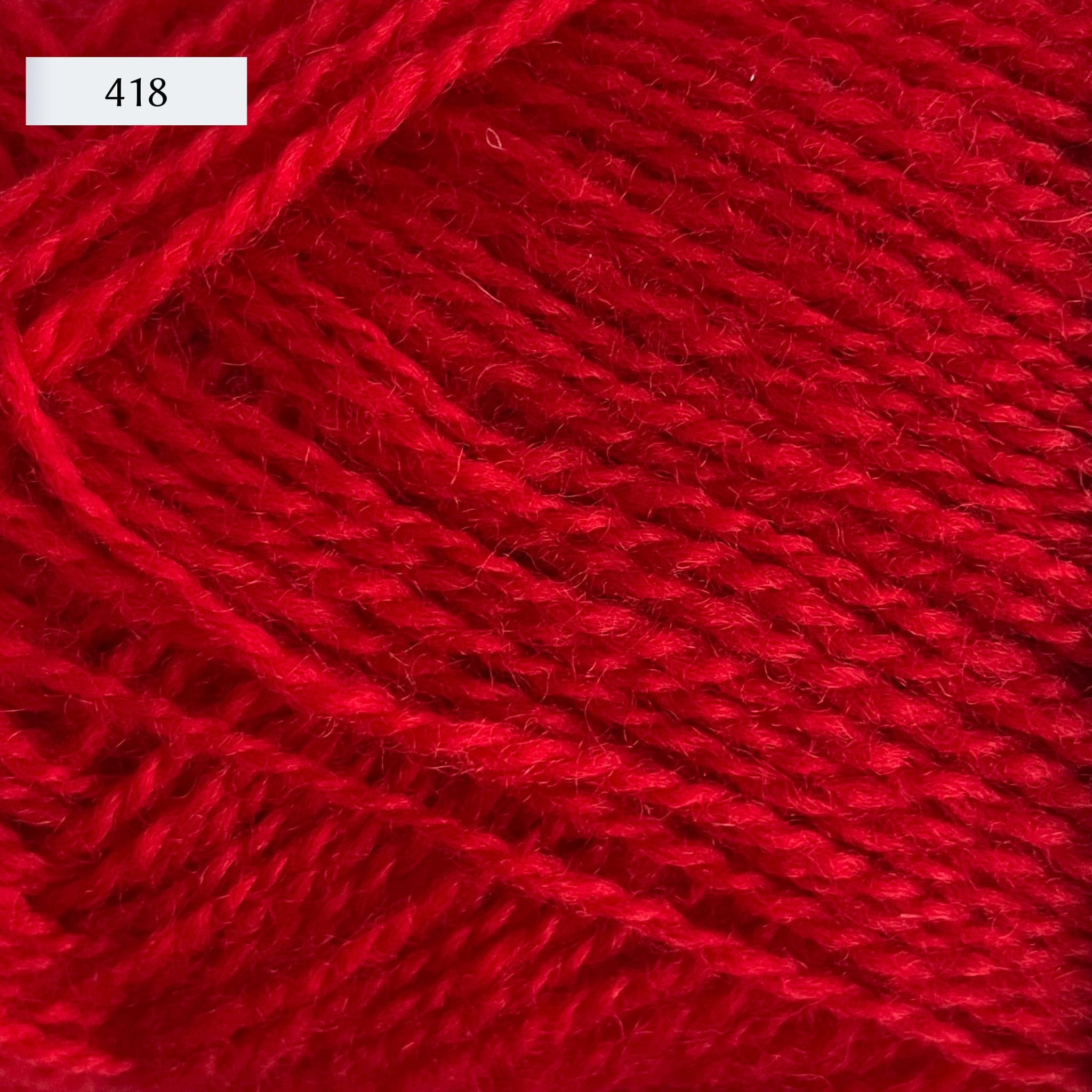 Rauma Finullgarn, a fingering/sport weight yarn, in color 418, a bright primary red