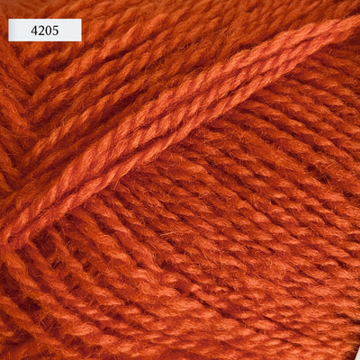 Rauma Finullgarn, a fingering/sport weight yarn, in color 4205, a bright primary orange