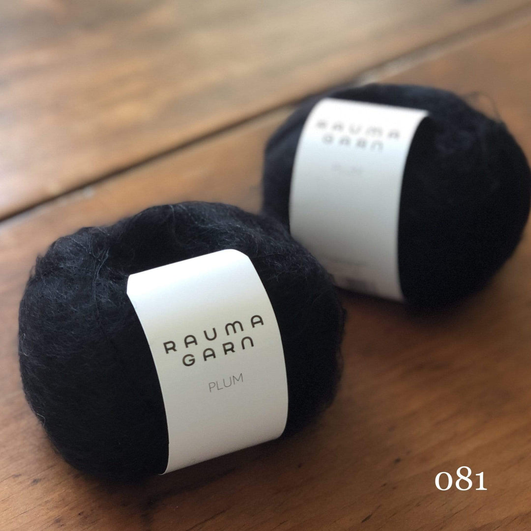 Two balls of Rauma Plum, a laceweight mohair blend yarn, in color 081, black