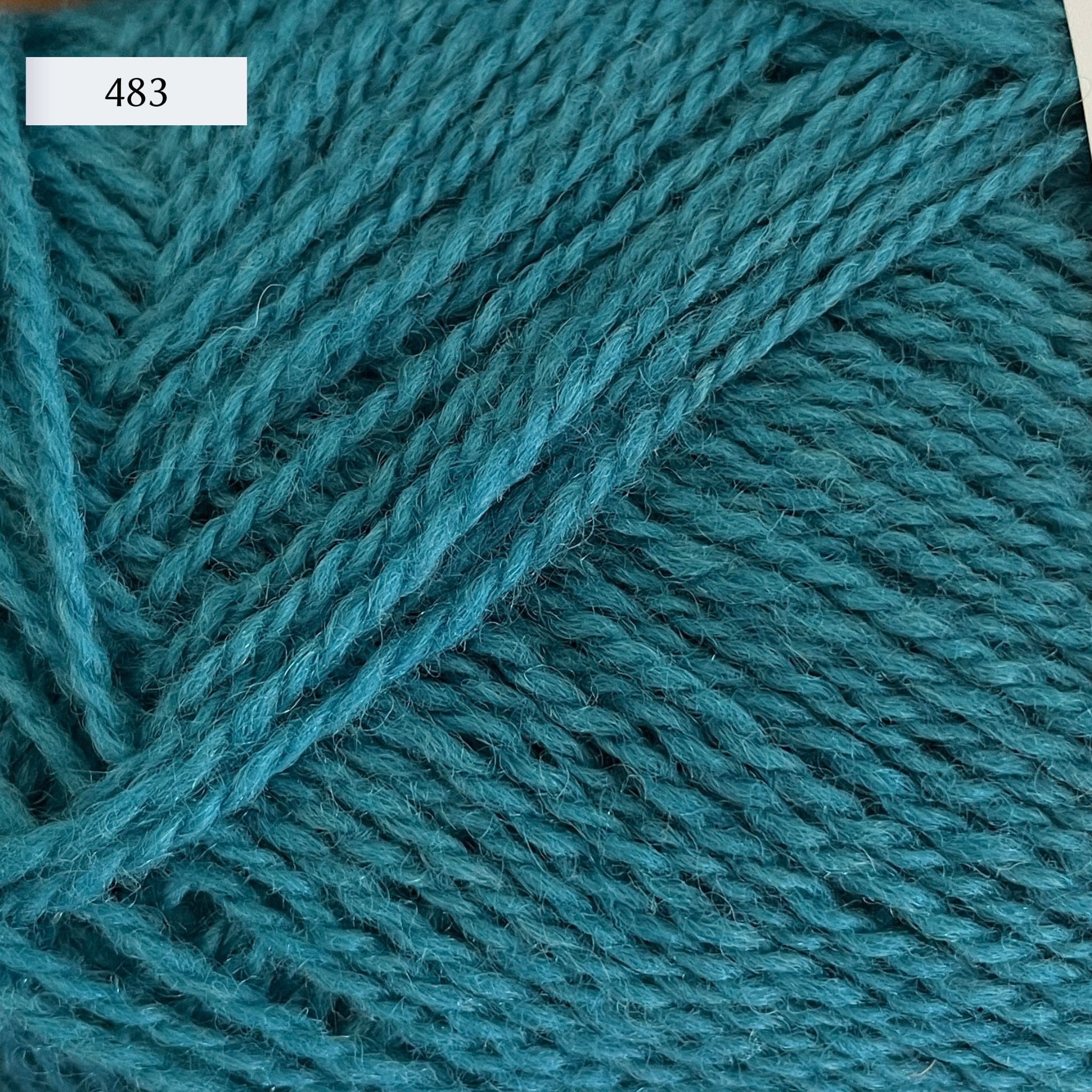 Rauma Finullgarn, a fingering/sport weight yarn, in color 482, a medium teal