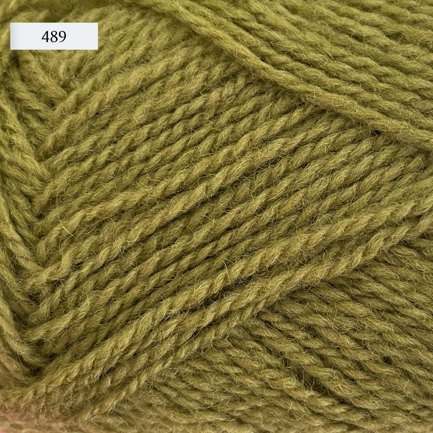 Rauma Finullgarn, a fingering/sport weight yarn, in color 489, light khaki green