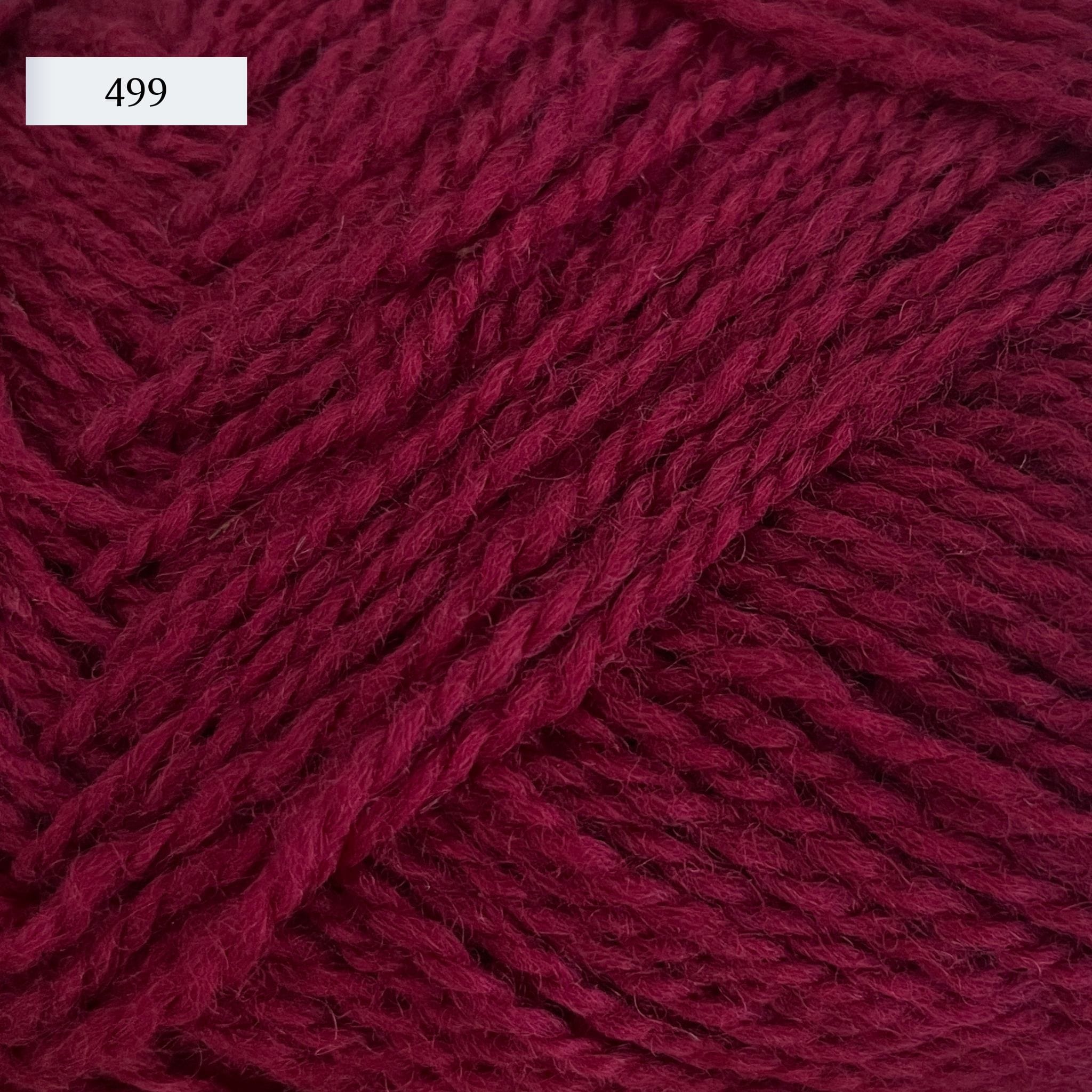 Rauma Finullgarn, a fingering/sport weight yarn, in color 499, a red-burgundy