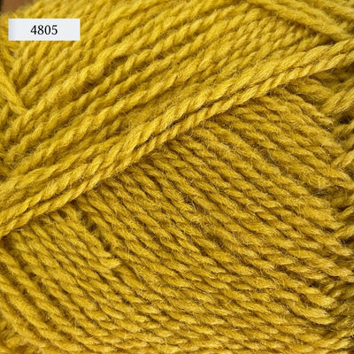 Rauma Finullgarn, a fingering/sport weight yarn, in color 4805, solid mustard yellow
