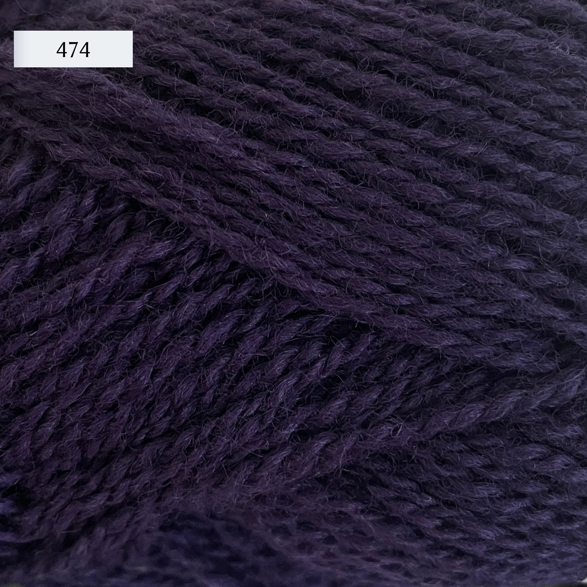 Rauma Finullgarn, a fingering/sport weight yarn, in color 474, a charcoal grey