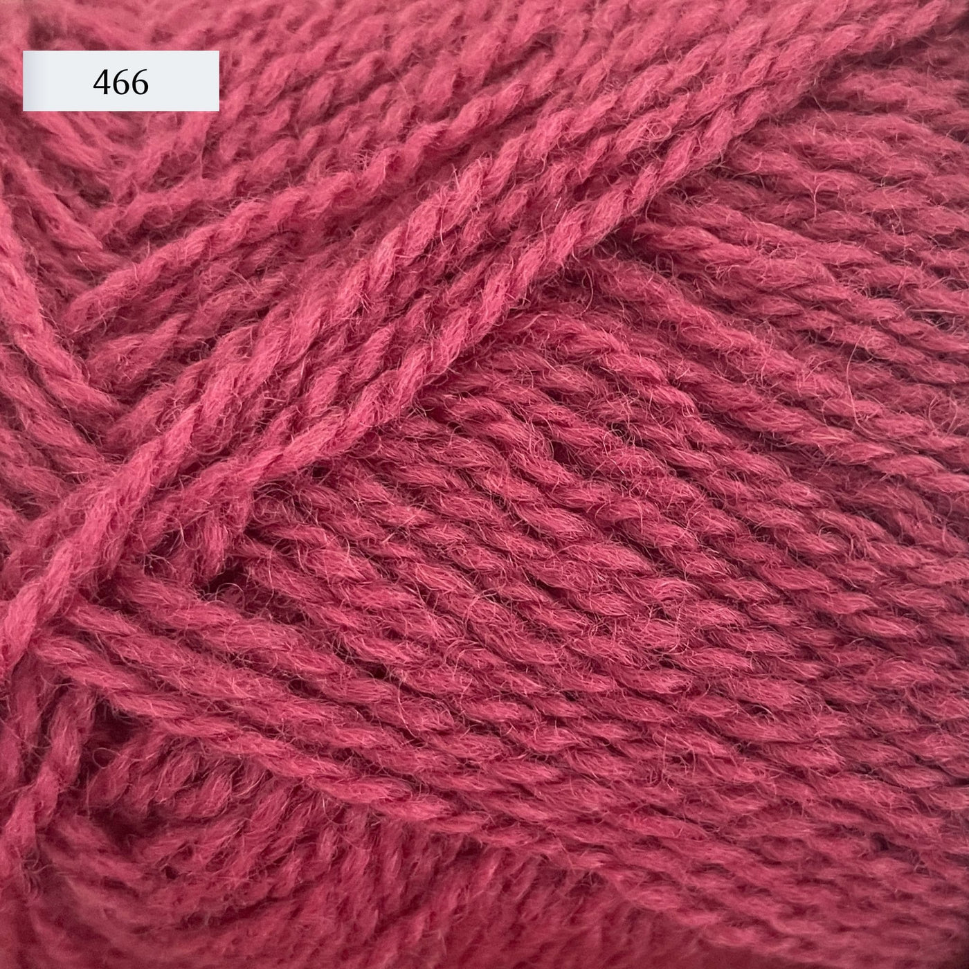 Rauma Finullgarn, a fingering/sport weight yarn, in color 466, a dusty raspberry pink