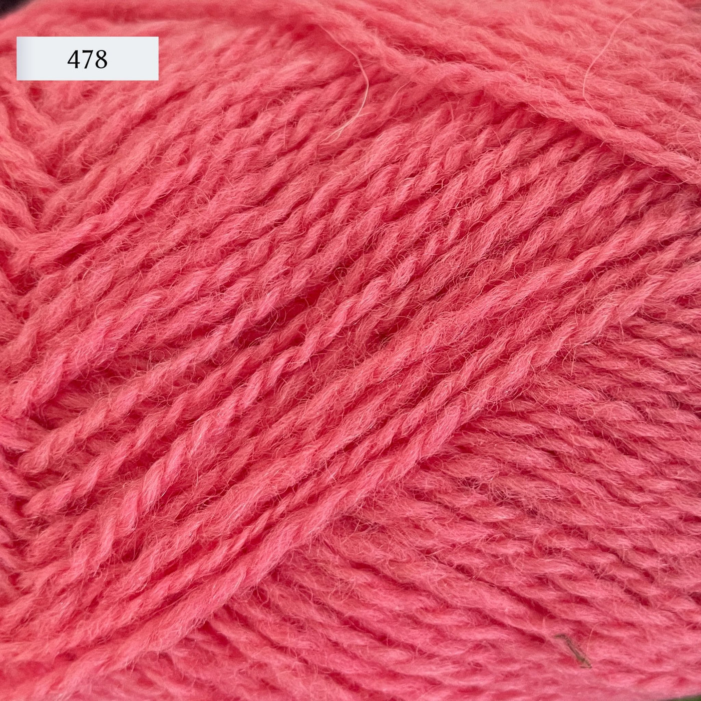 Rauma Finullgarn, a fingering/sport weight yarn, in color 478, a cotton candy pink