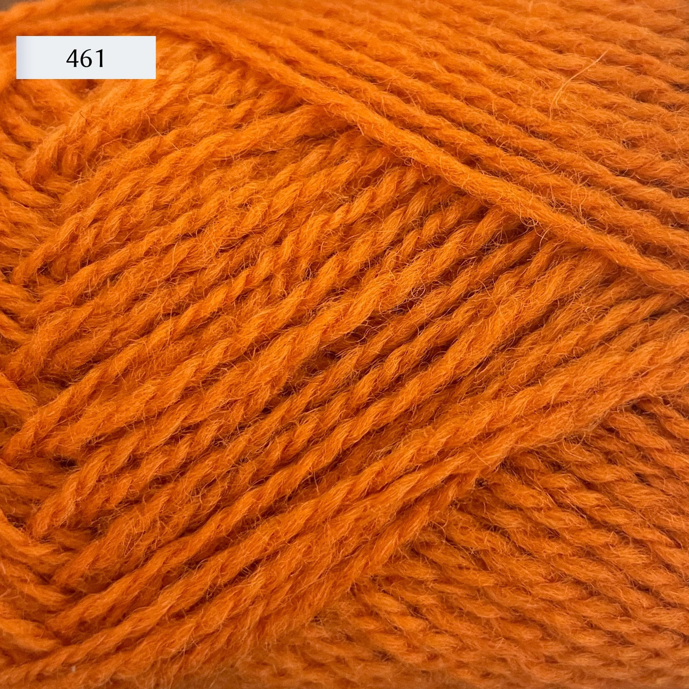Rauma Finullgarn, a fingering/sport weight yarn, in color 461, a bright orange