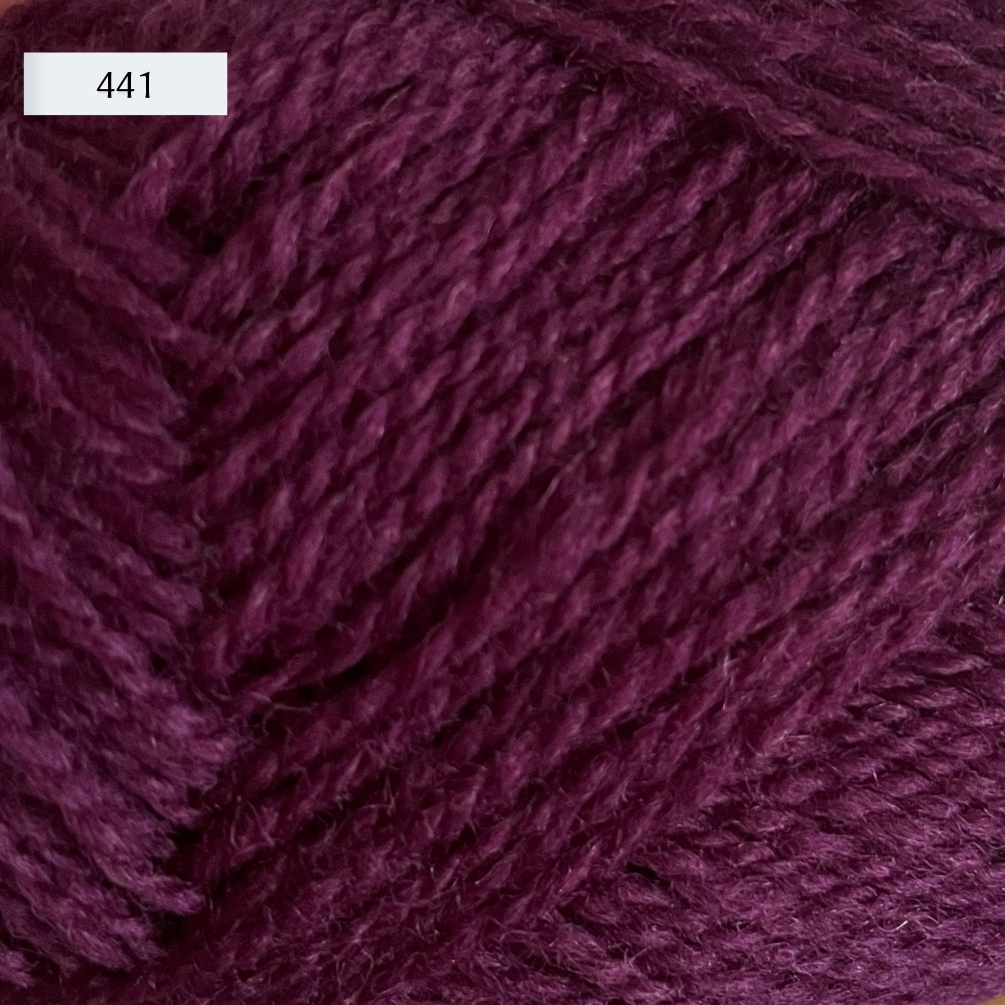Rauma Finullgarn, a fingering/sport weight yarn, in color 441, a deep maroon-purple
