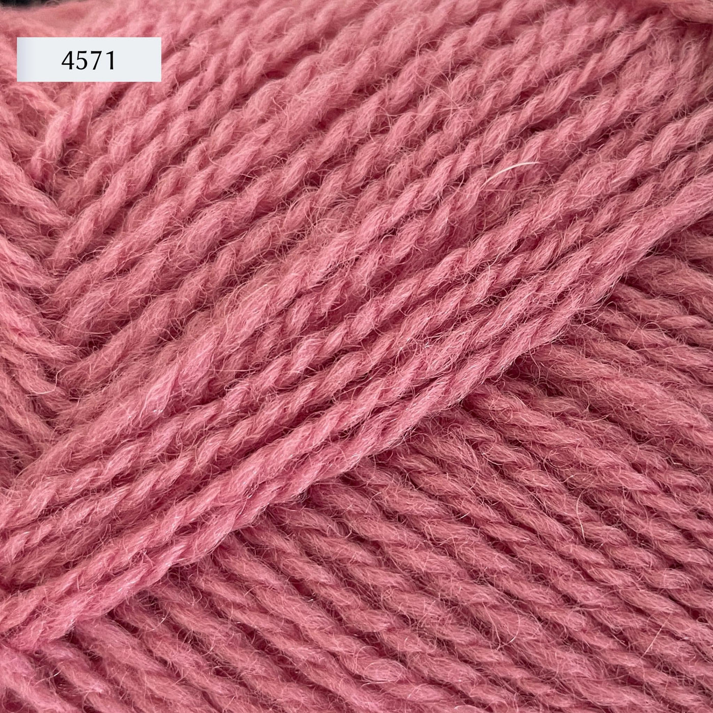Rauma Finullgarn, a fingering/sport weight yarn, in color 4571, light bubblegum pink