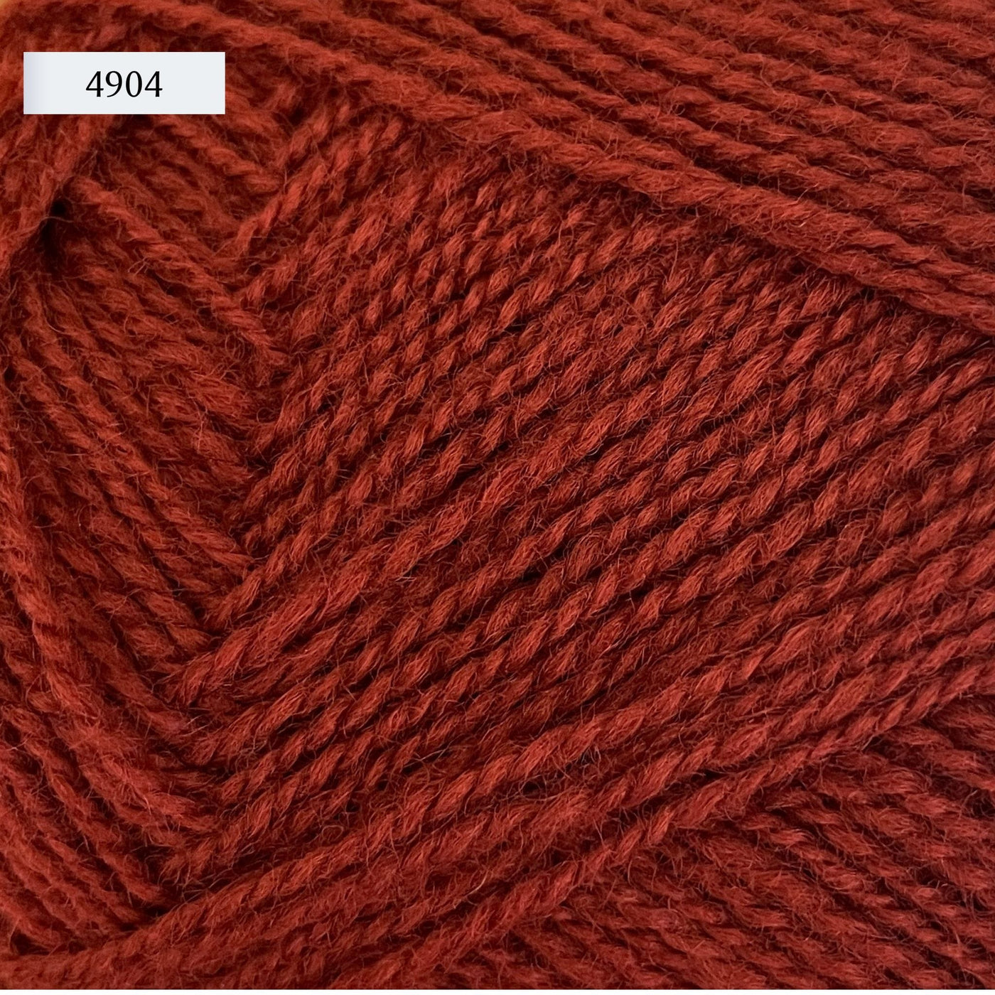 Rauma Gammelserie 2ply wool yarn, fingering weight, in color 4904, a rusty red