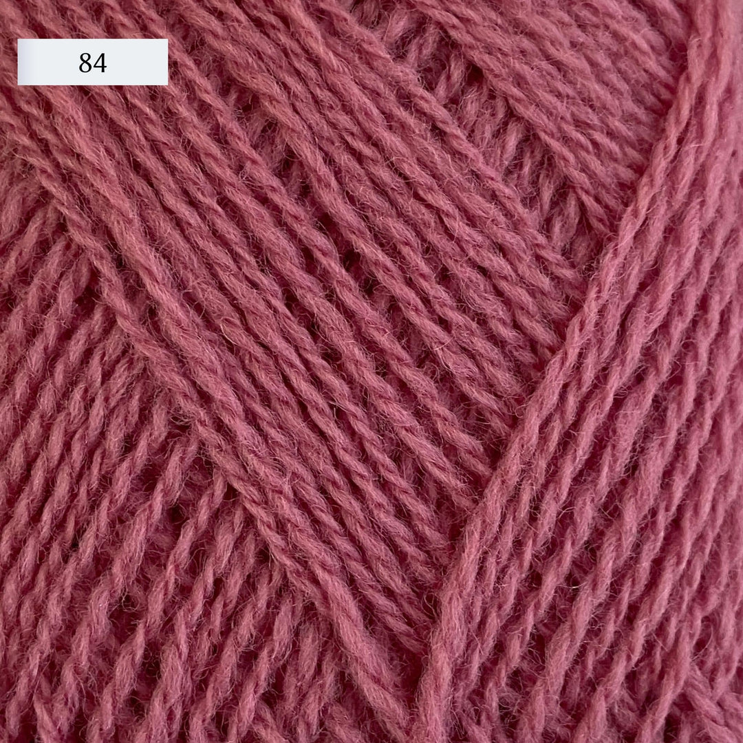 Rauma Lamullgarn, a fingering weight yarn, in color 84, a rose pink