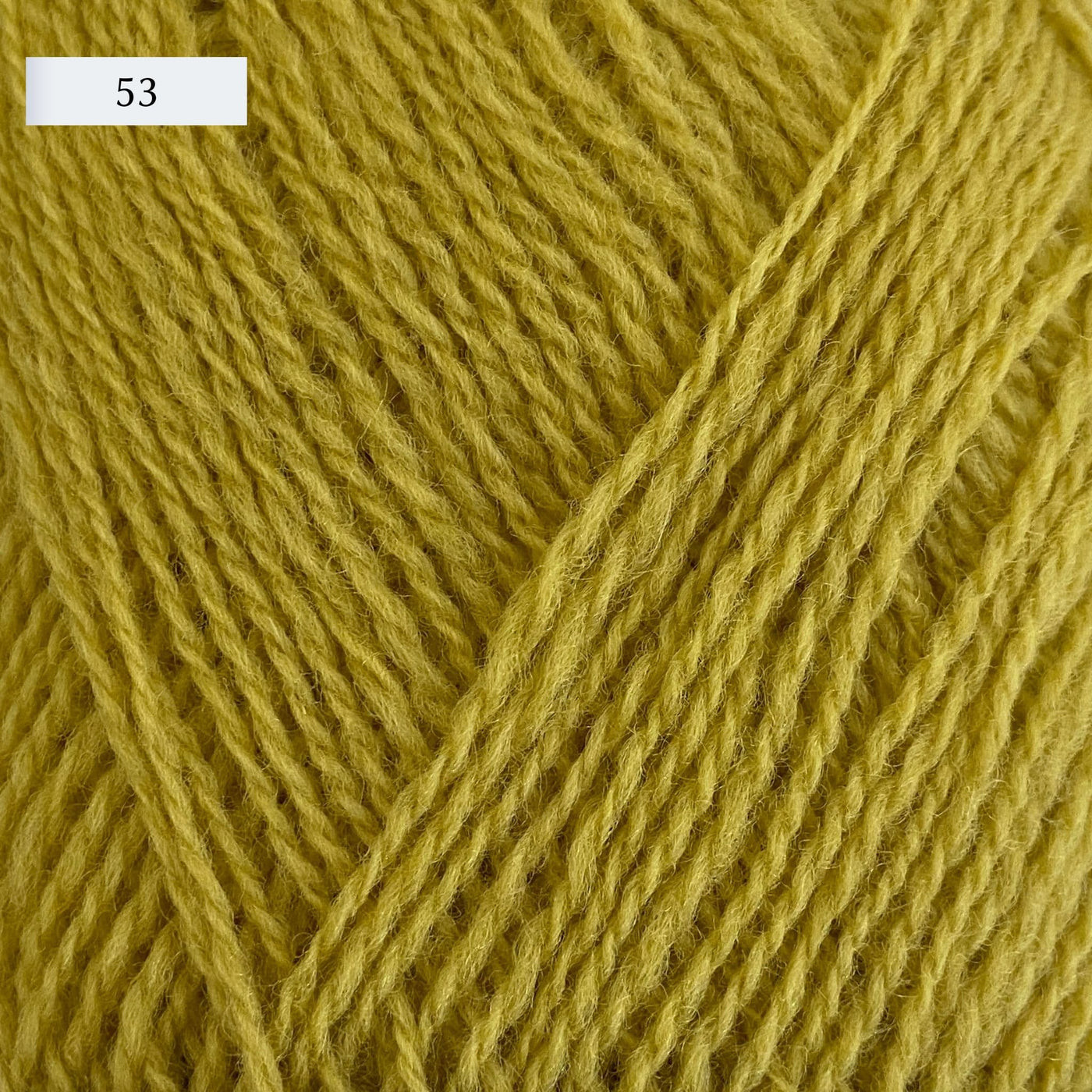 Rauma Lamullgarn, a fingering weight yarn, in color 53, a bright lemon yellow