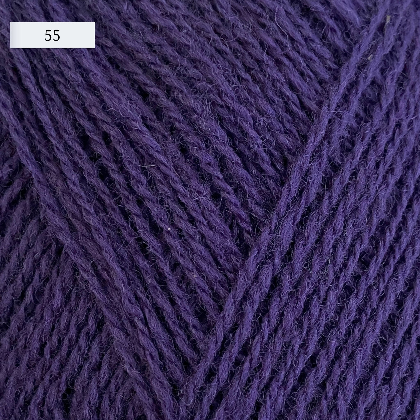 Rauma Lamullgarn, a fingering weight yarn, in color 55, a bright grape purple