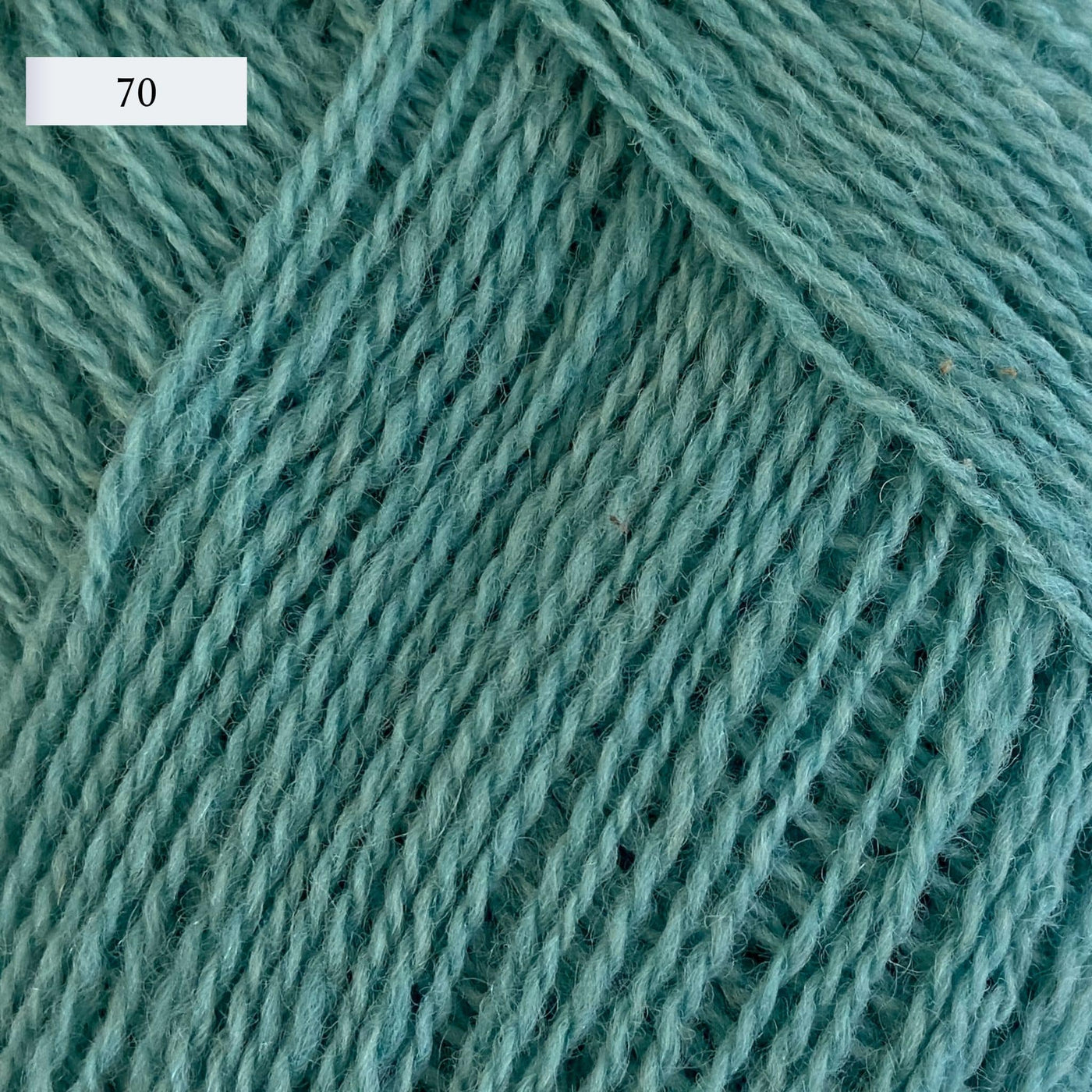 Rauma Lamullgarn, a fingering weight yarn, in color 70, a seafoam green