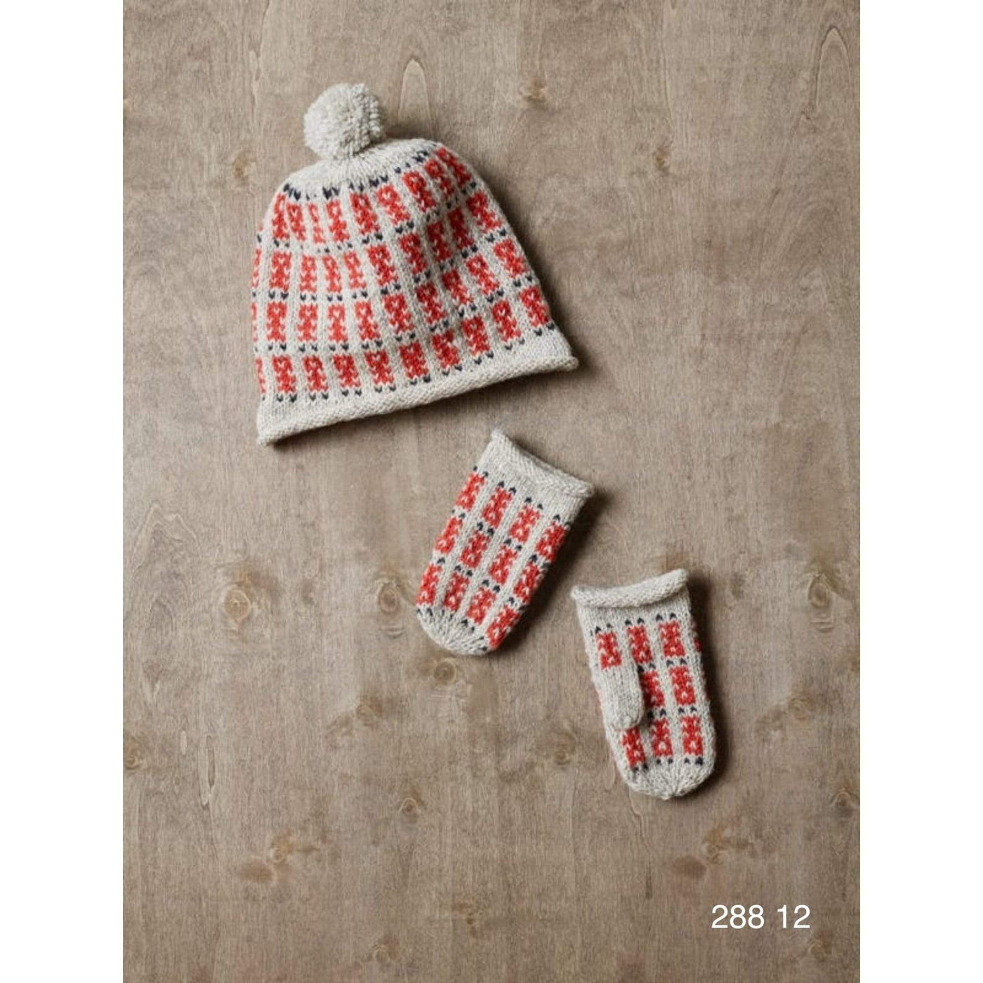 A colorwork set of children's hat and mittens knit in Strikkegarn using Rauma pattern 288-12.
