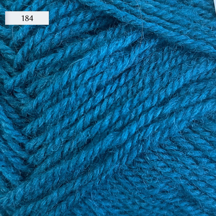 Rauma Strikkegarn, DK weight yarn, in color 184, a mid-tone blue with greenish undertones