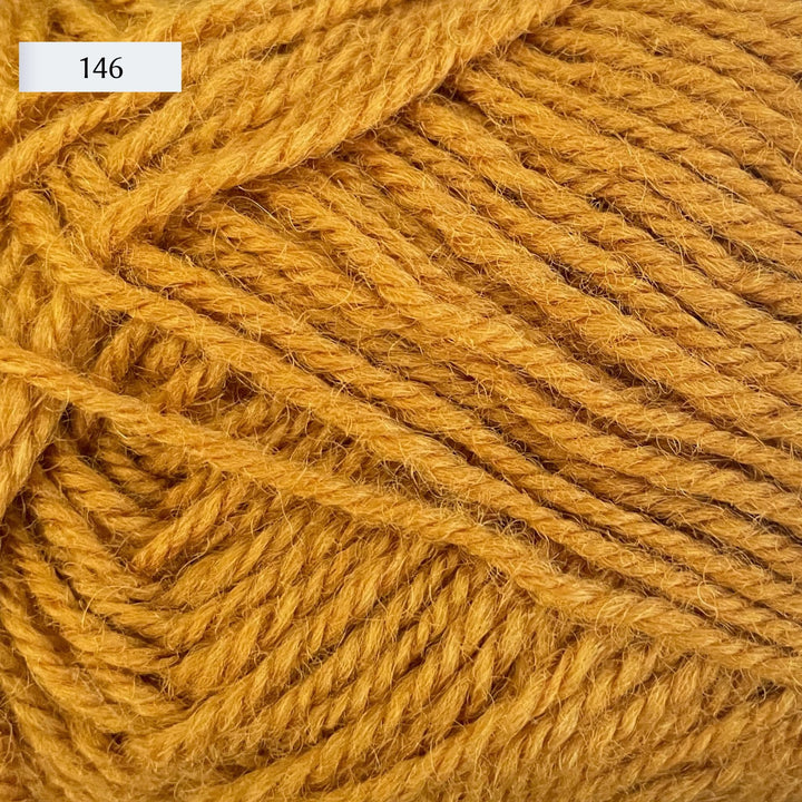 Rauma Strikkegarn, DK weight yarn, in color 146, golden mustard yellow