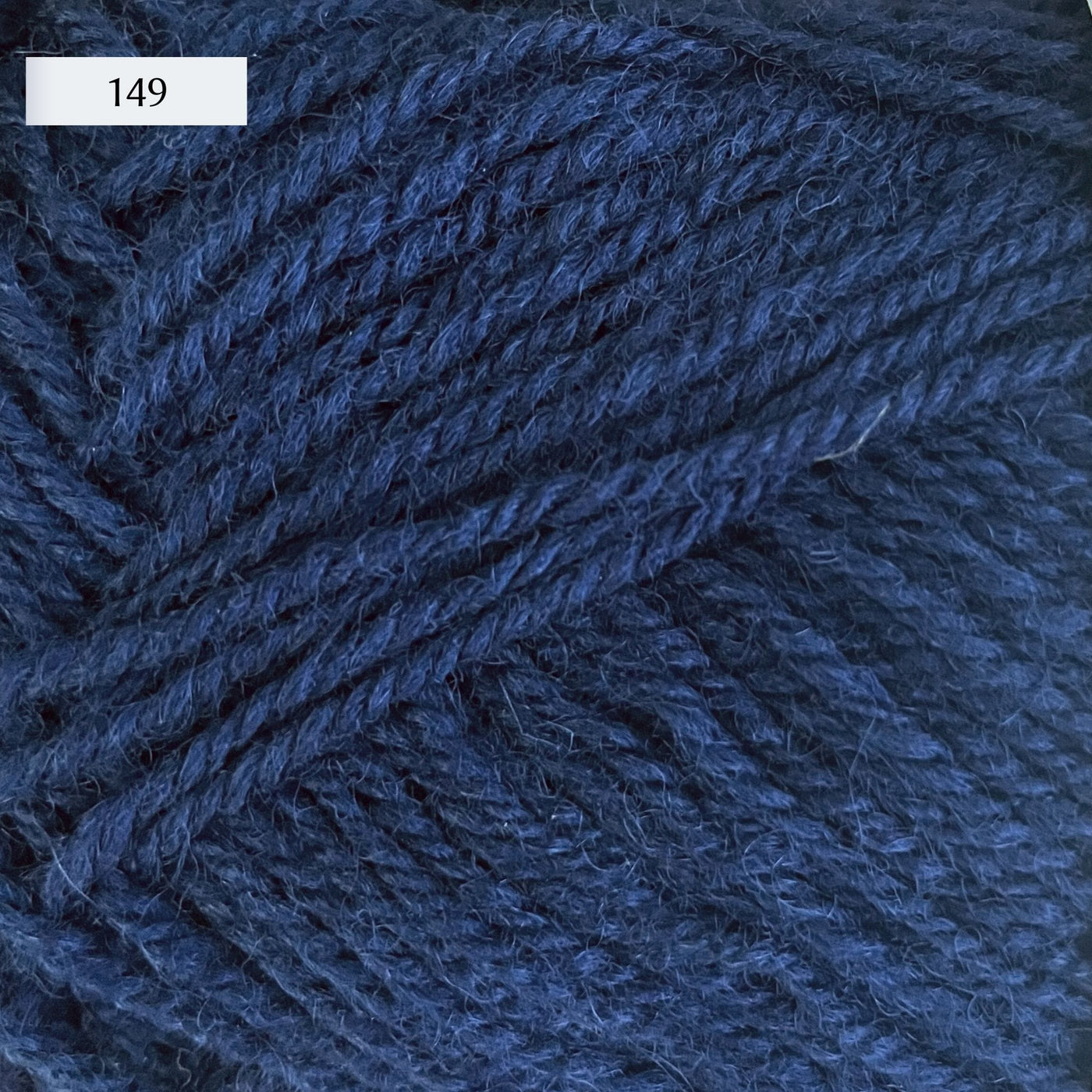 Rauma Strikkegarn, DK weight yarn, in color 149, dusty mid-tone denim blue