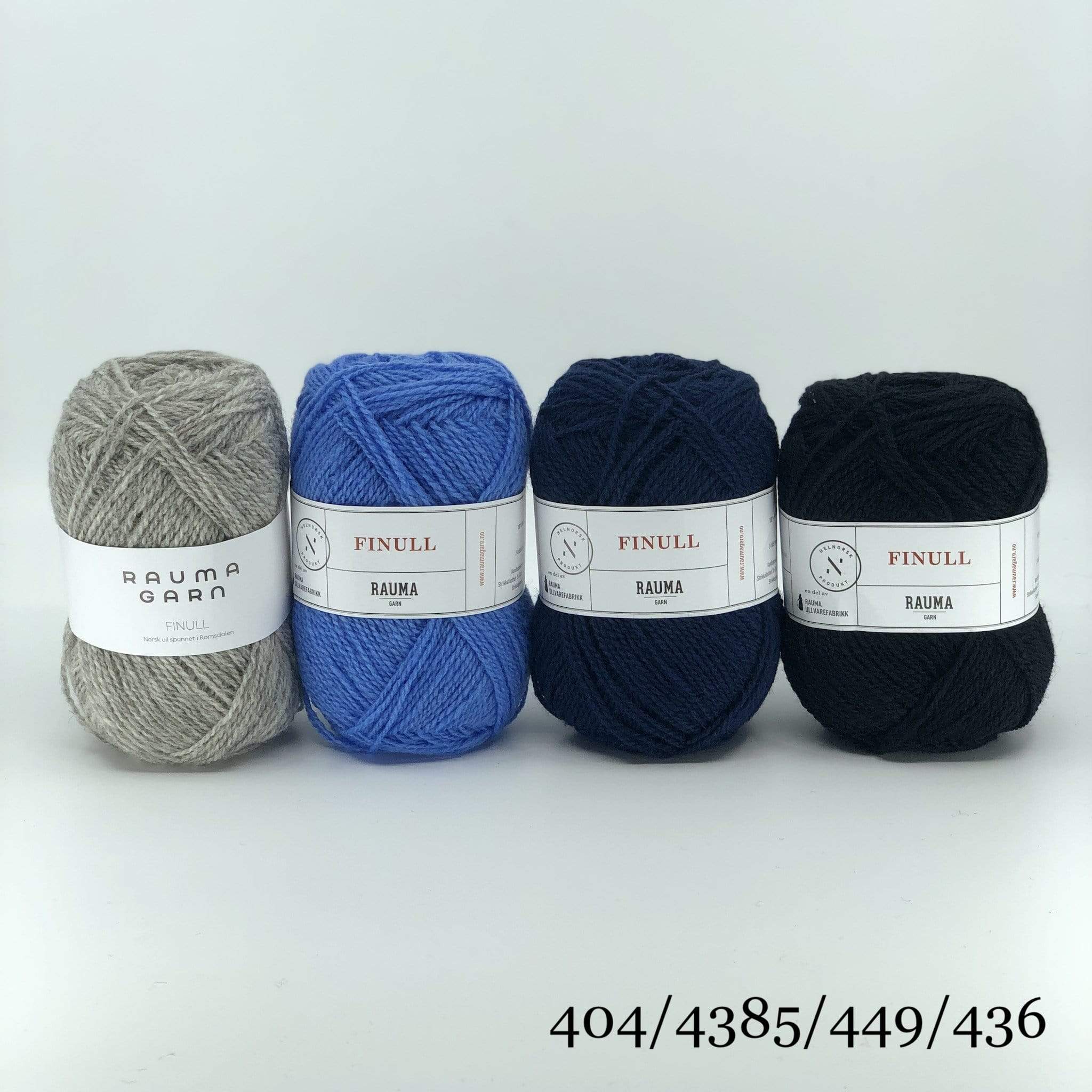 The Woolly Thistle Varde Yoke Sweater 275R in Rauma Finullgarn- 4 balls of Rauma Garn yarn in grey, blue, dark blue, and black
