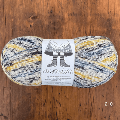 The Woolly Thistle Retrosaria Mondim Fingering Weight Yarn in 210 (mix of blue, yellow, and cream)