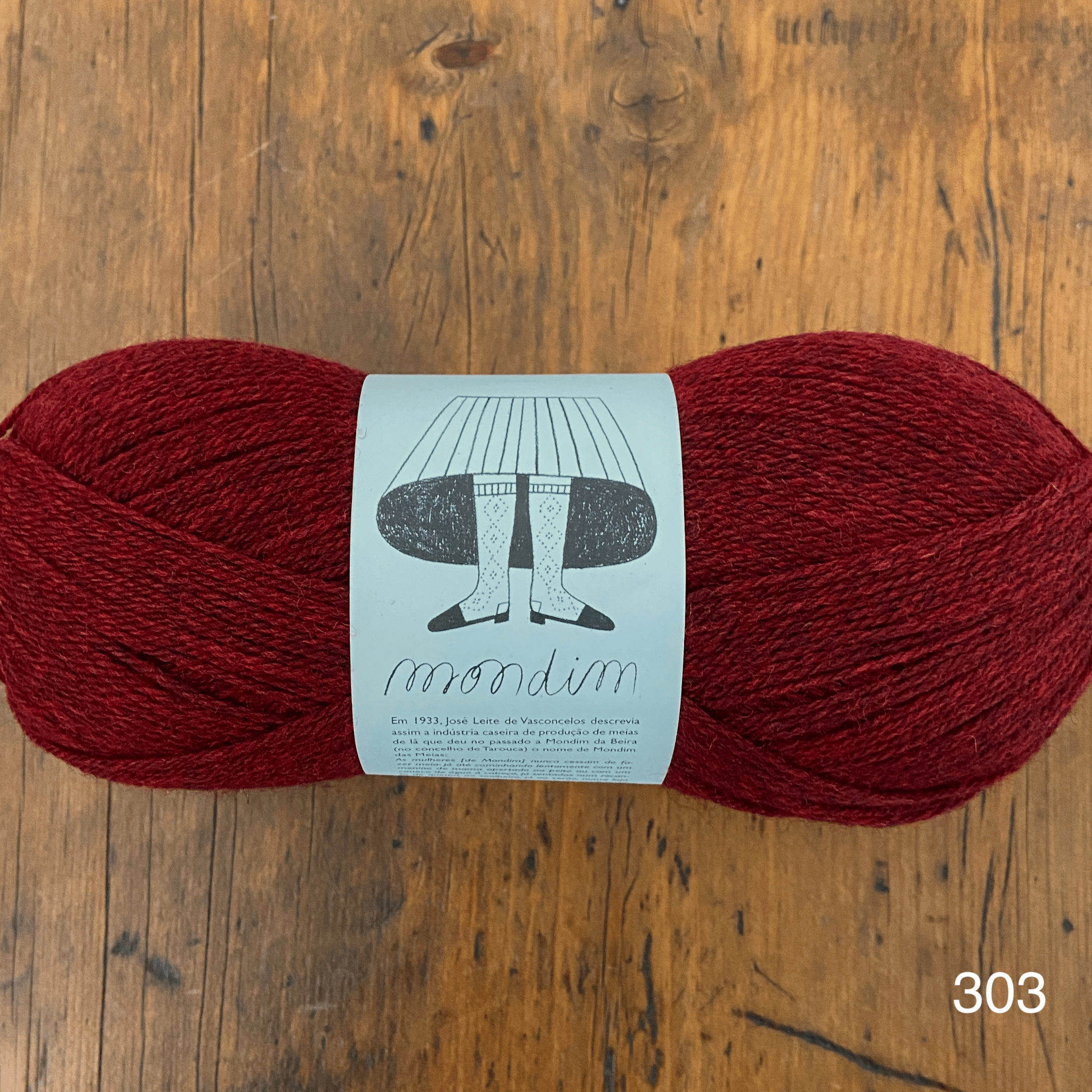 The Woolly Thistle Retrosaria Mondim Fingering Weight Yarn in 303 (red)