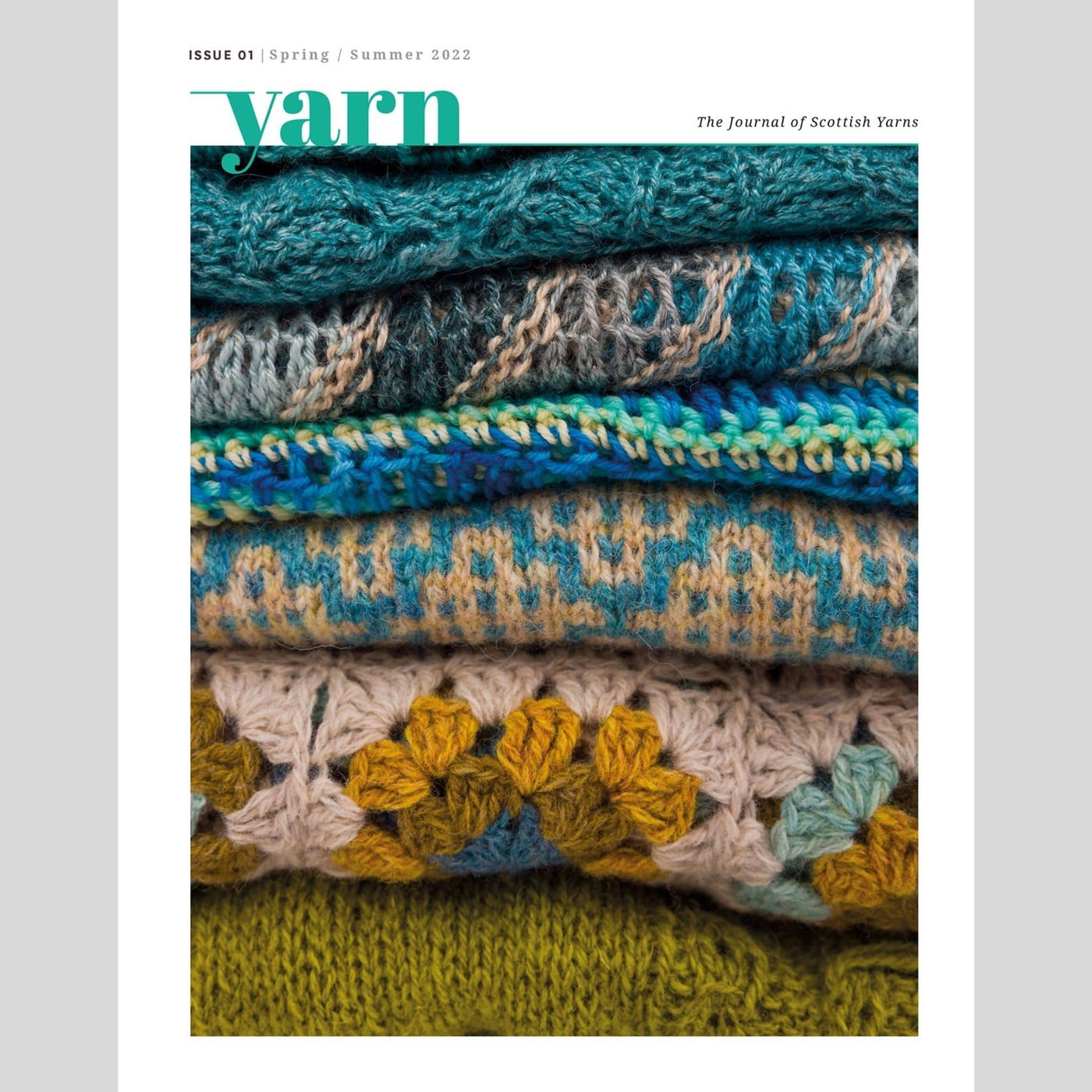 Cover of Yarn-The Journal of Scottish Yarns publication. Cover shows a folded pile of knit and crochet fabrics.