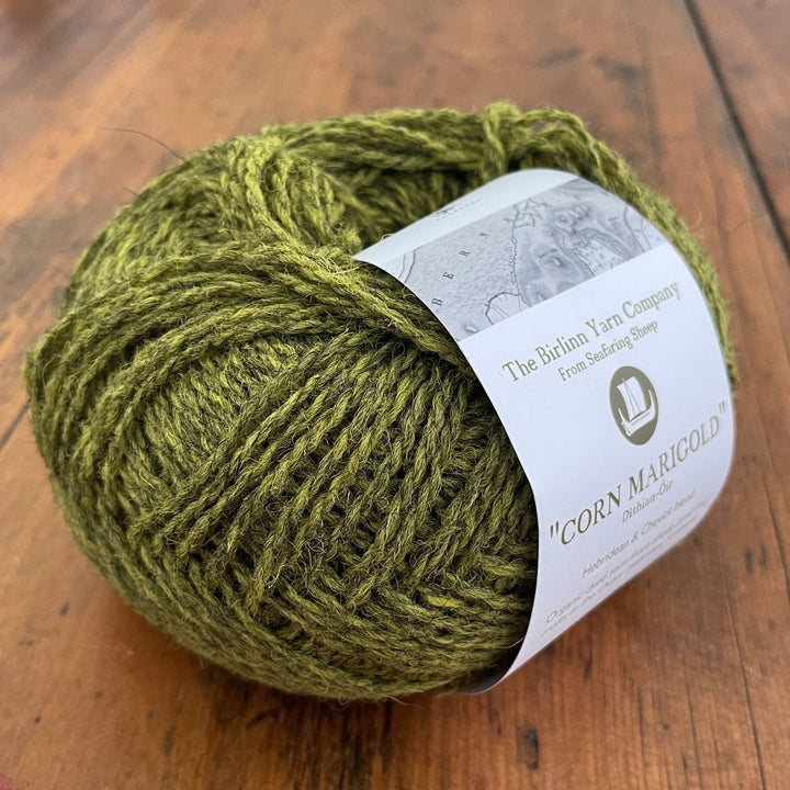 Birlinn Yarn Company Hebridean 4ply yarn shown in Corn Marigold (Heathered green with yellow undertone)