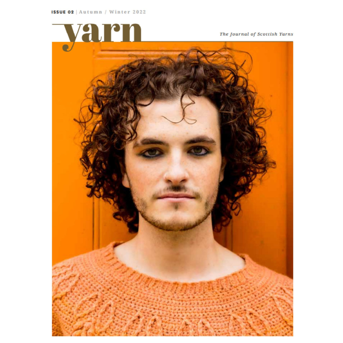 Yarn The Journal of Scottish Yarns cover shows portrait of model wearing orange sweater against orange background.