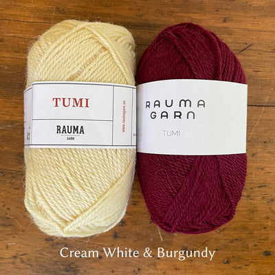 Rauma Tumi yarn; one cream ball and one burgundy ball of yarn.