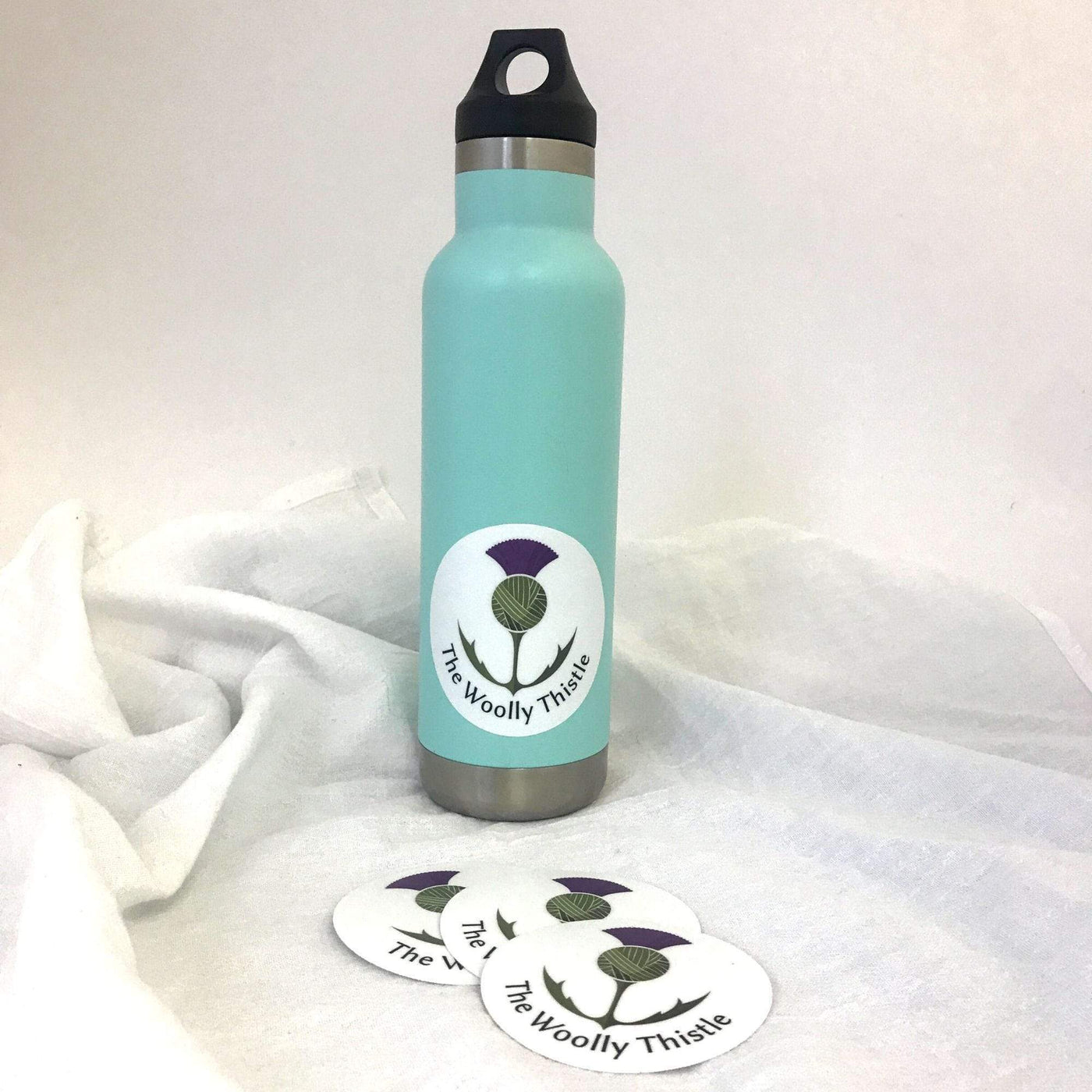 The Woolly Thistle Sticker on a water bottle.