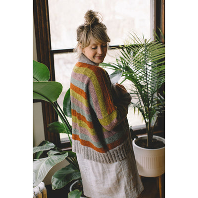 Woman wearing Douglas Cardi by Andrea Mowry - a striped, oversized cardigan knit in Tukuwool DK yarn