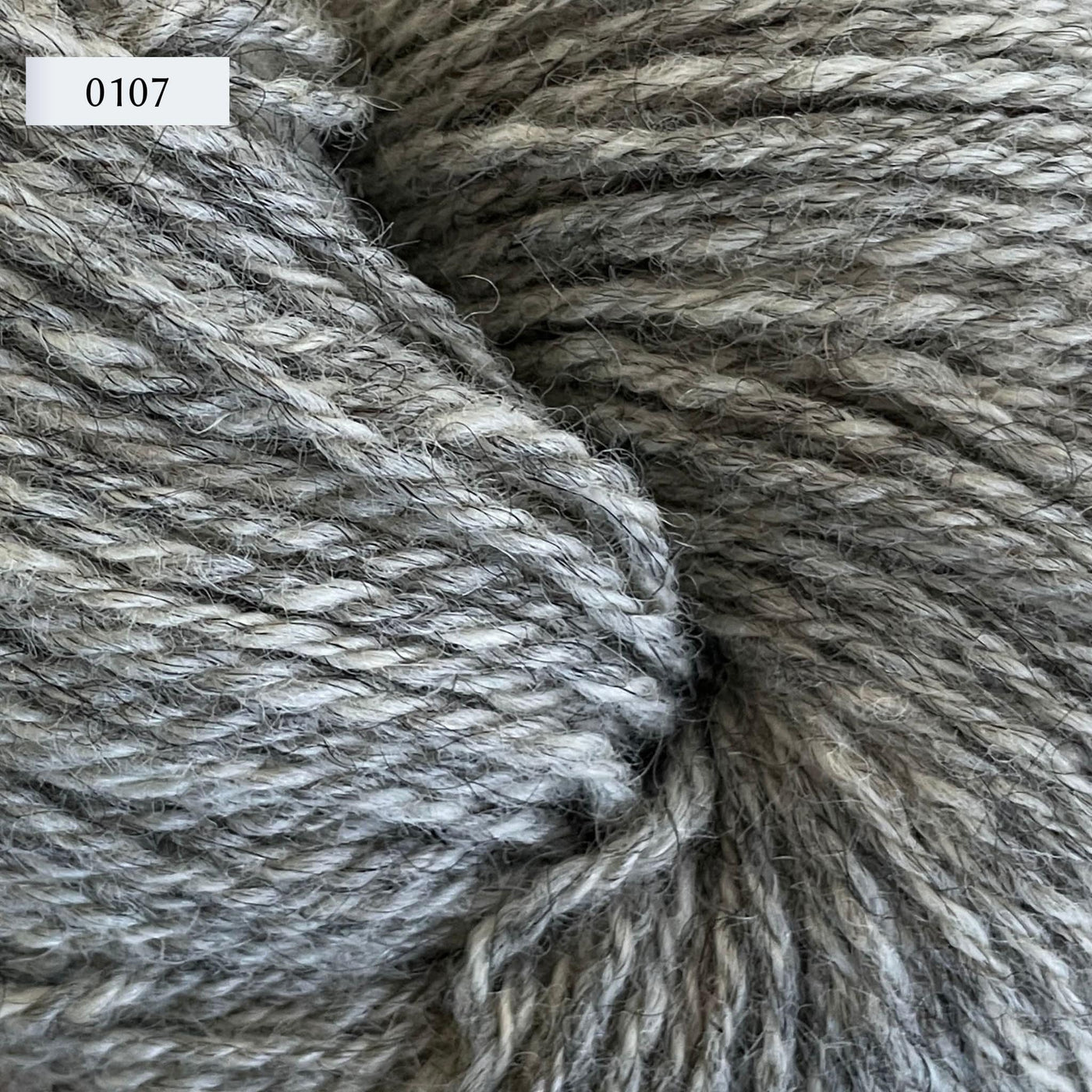 Ullcentrum 3ply, a worsted weight wool yarn, in color 0107, a heathered mid-light grey