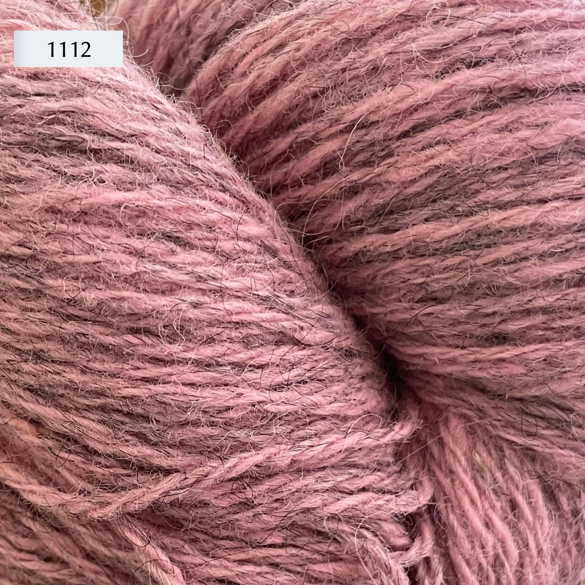 Ullcentrum 3ply, a worsted weight wool yarn, in color 1112, a heathered ballet pink