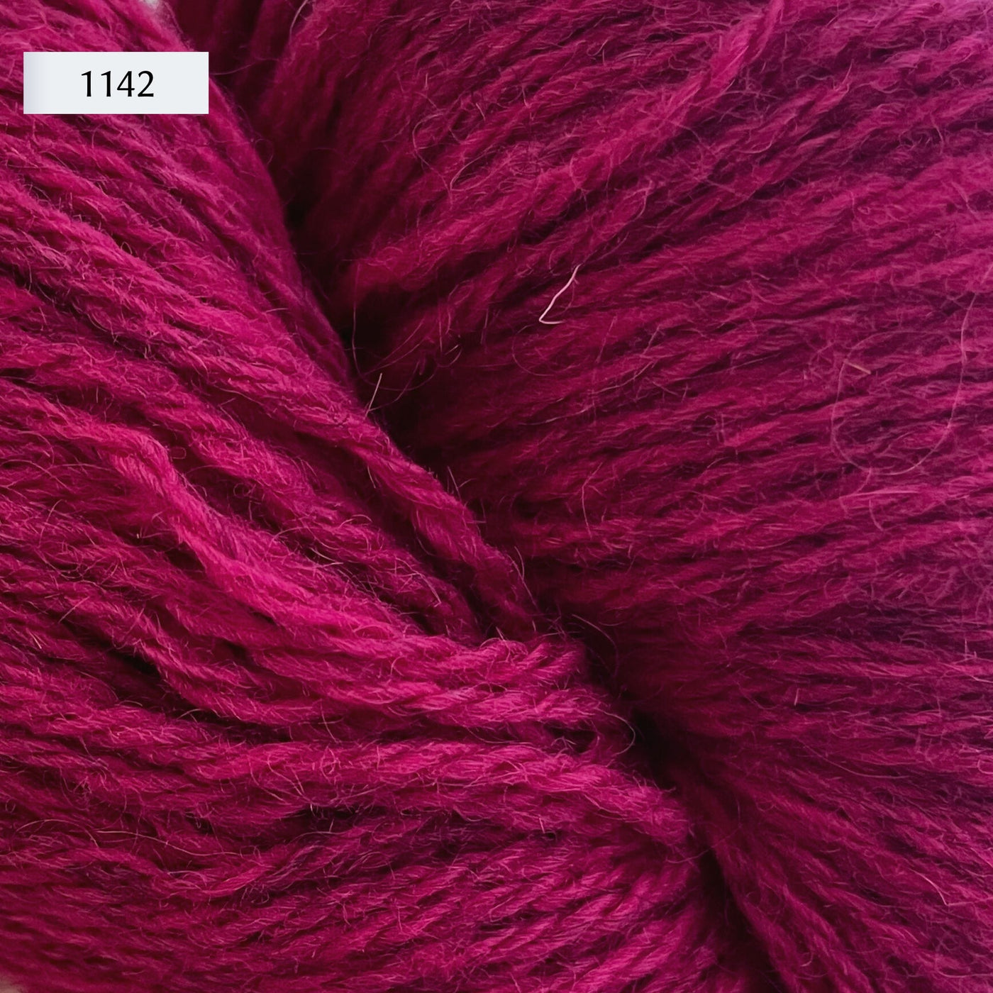 Ullcentrum 3ply, a worsted weight wool yarn, in color 1142, a fuschia