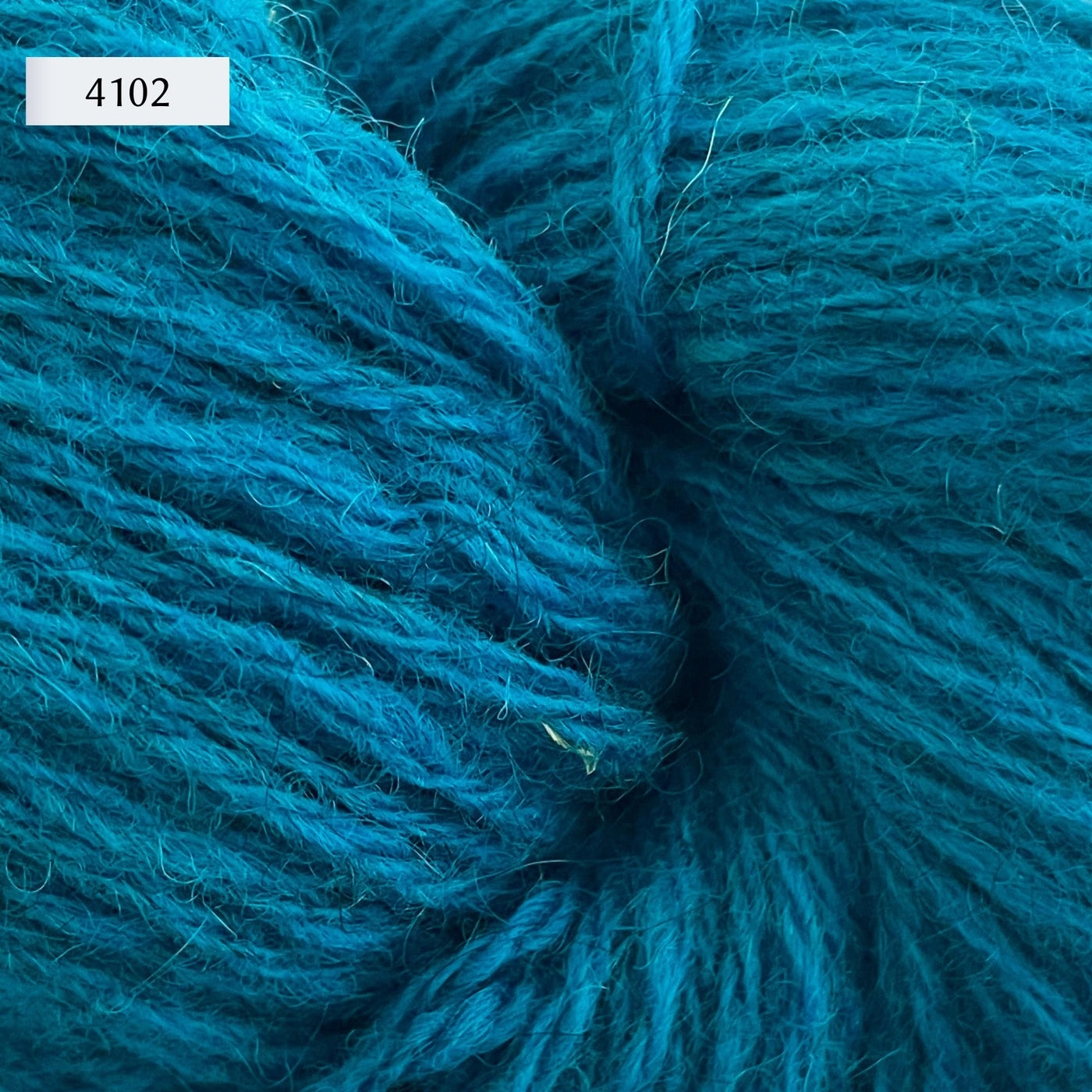 Ullcentrum 3ply, a worsted weight wool yarn, in color 4102, a bright turquoise blue