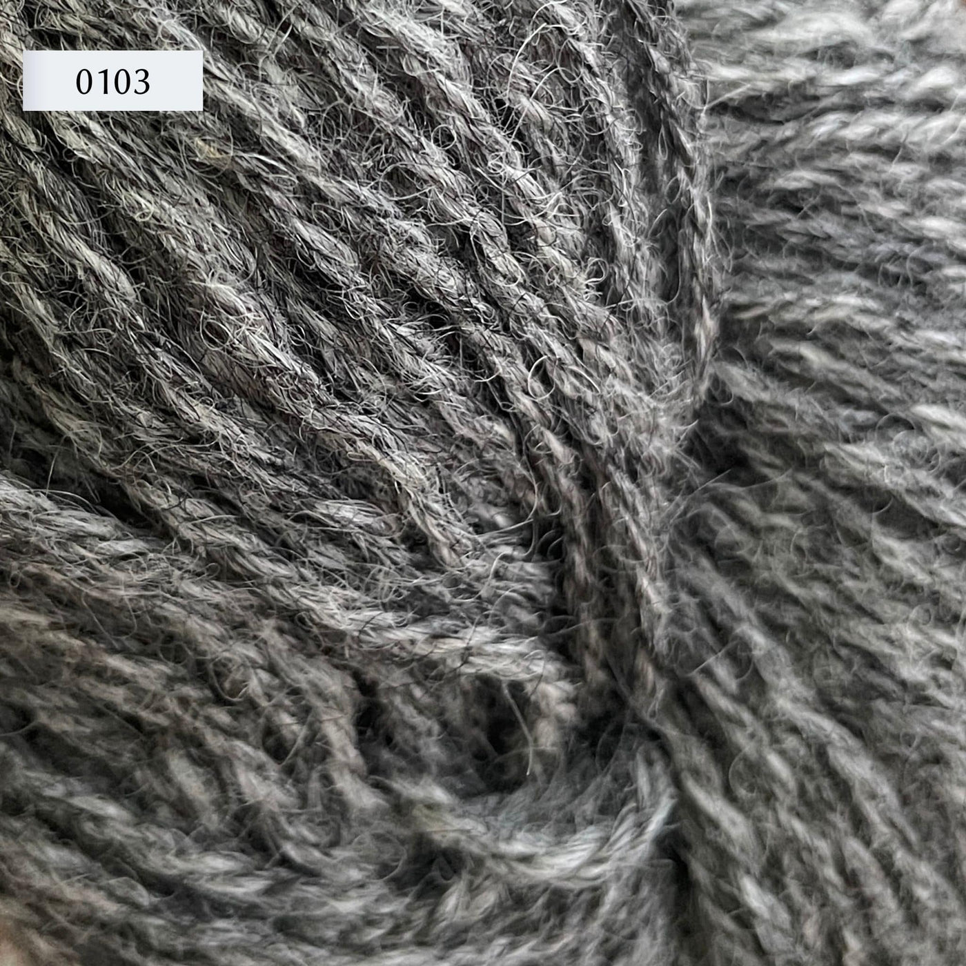 Ullcentrum 3ply, a worsted weight wool yarn, in color 0103, a heathered mid-grey