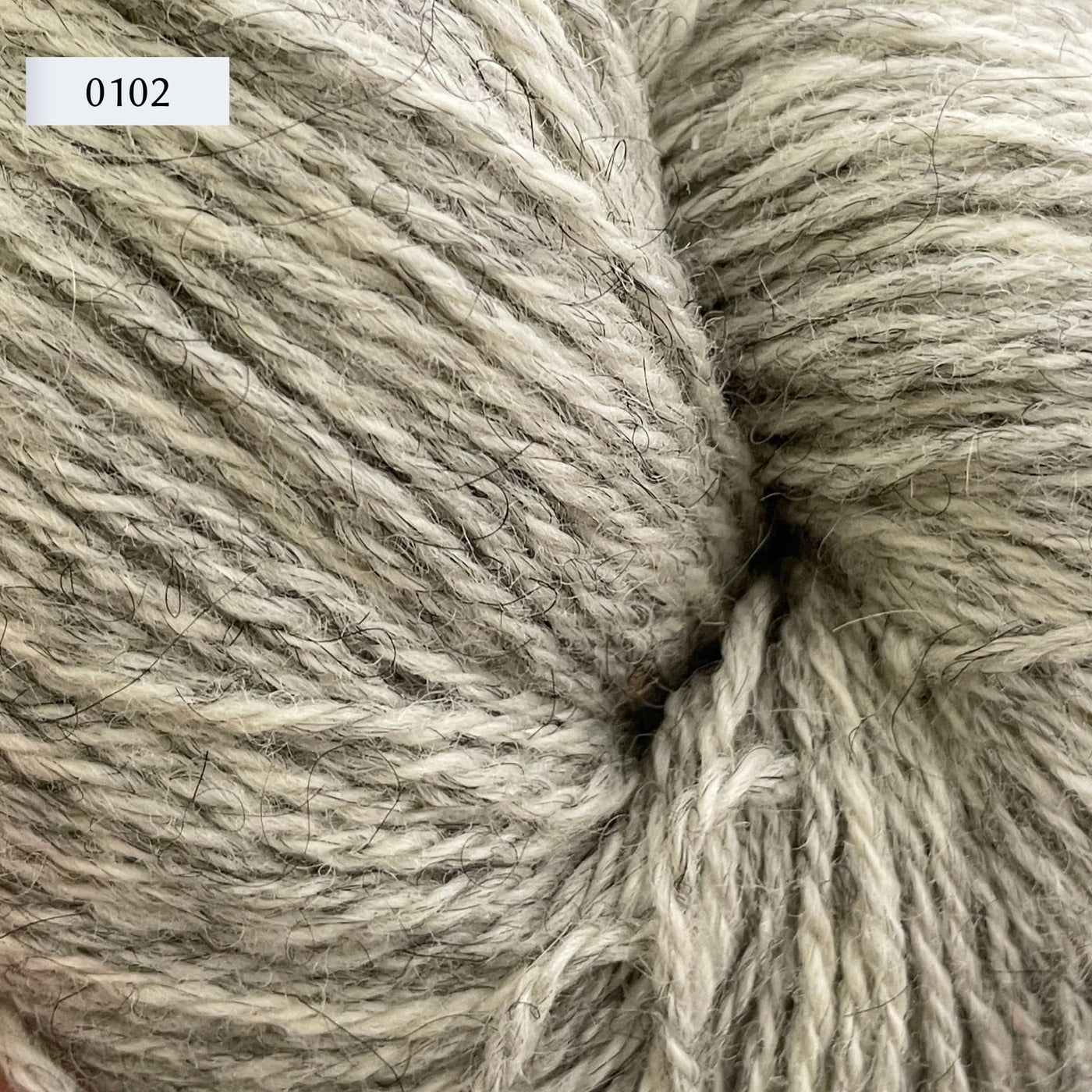 Ullcentrum 3ply, a worsted weight wool yarn, in color 0102, heathered light grey
