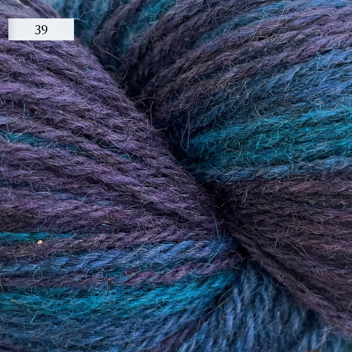 Ullcentrum 3ply, a worsted weight wool yarn, in color 39, a variegated blue-purple
