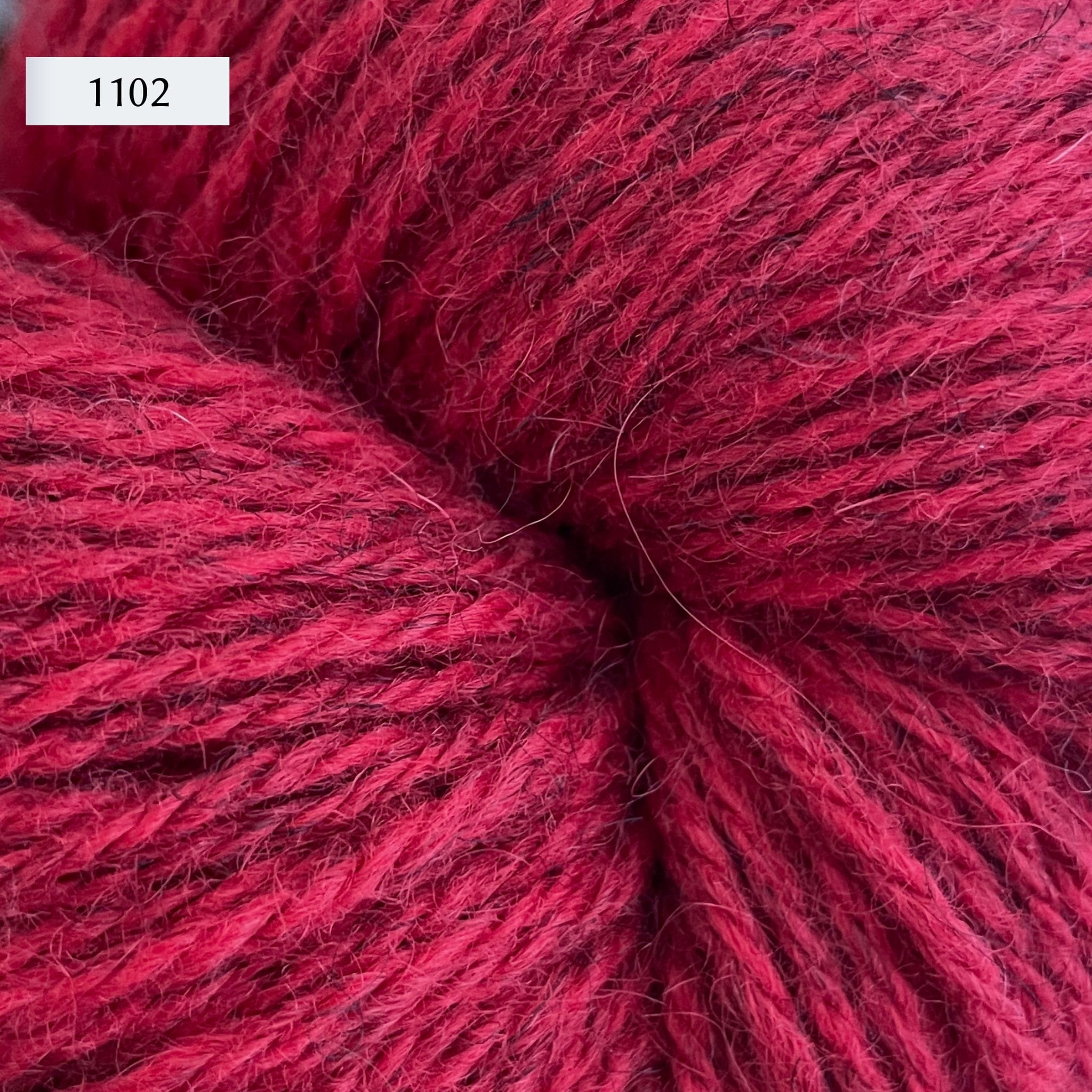 Ullcentrum 3ply, a worsted weight wool yarn, in color 1102, a heathered cherry red