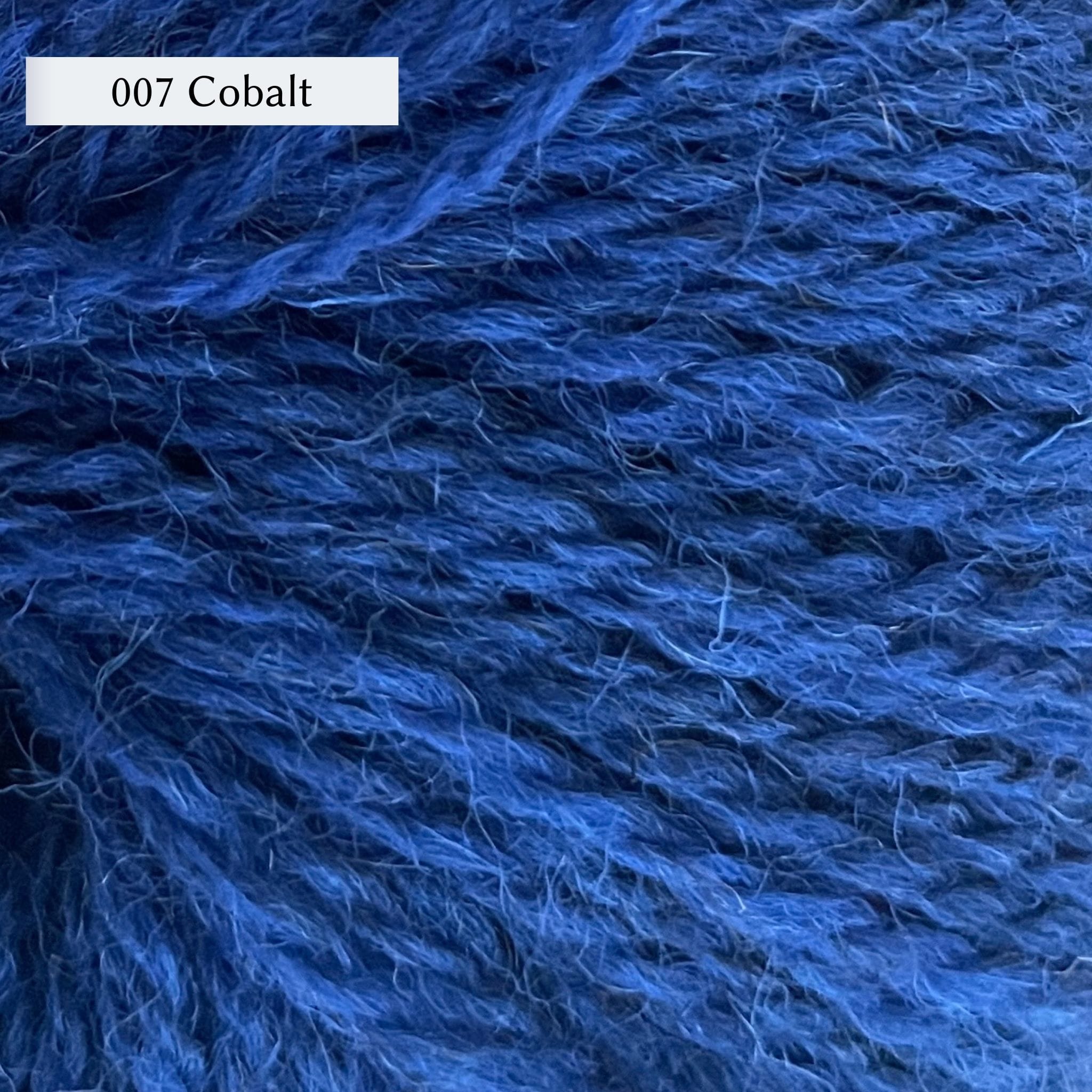 Wensleydale Longwool Sheep Shop Tweed 4 ply, a fingering weight yarn, in color 007 Cobalt, a royal blue