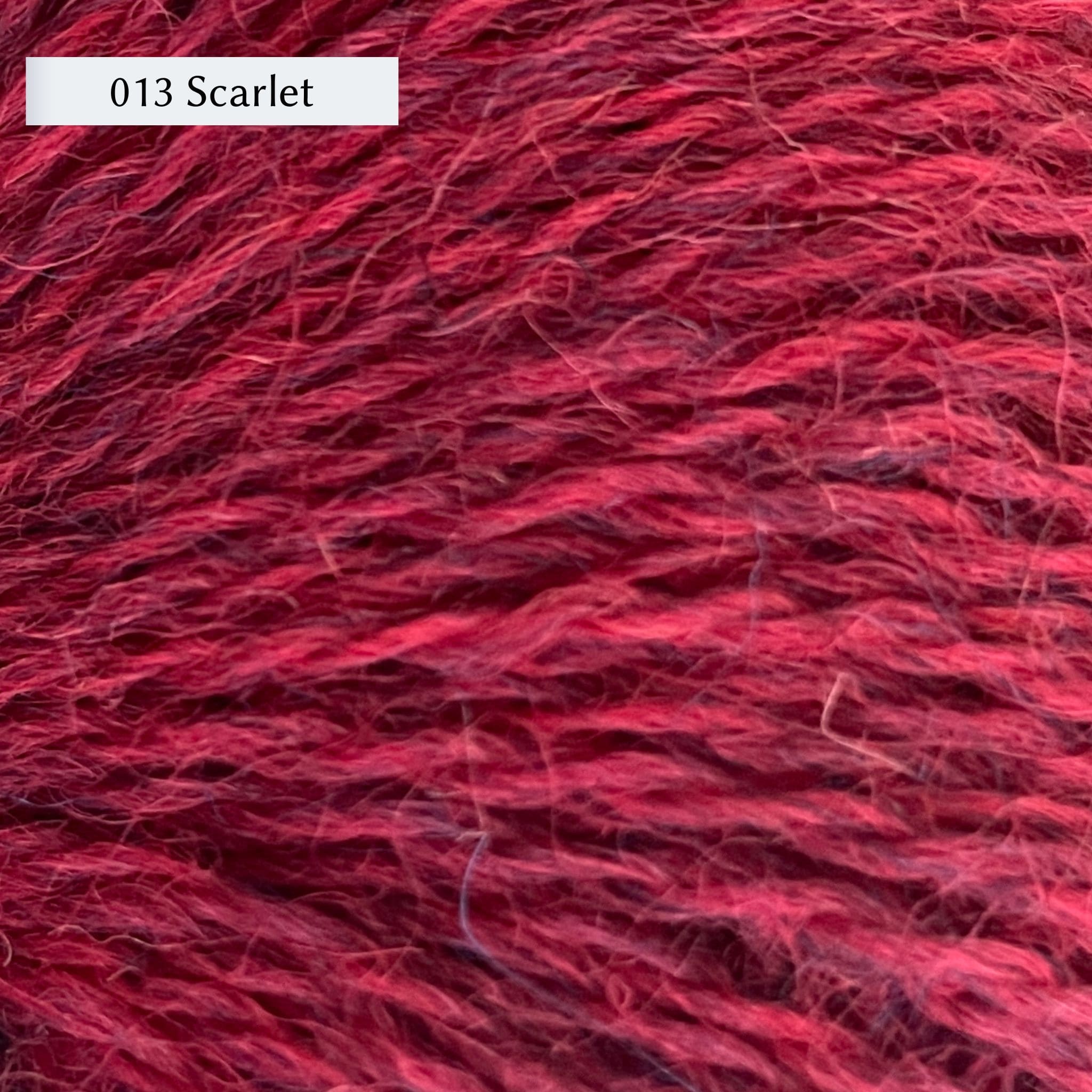 Wensleydale Longwool Sheep Shop Tweed 4 ply, a fingering weight yarn, in color 013 Scarlet, a heathered medium-dark red